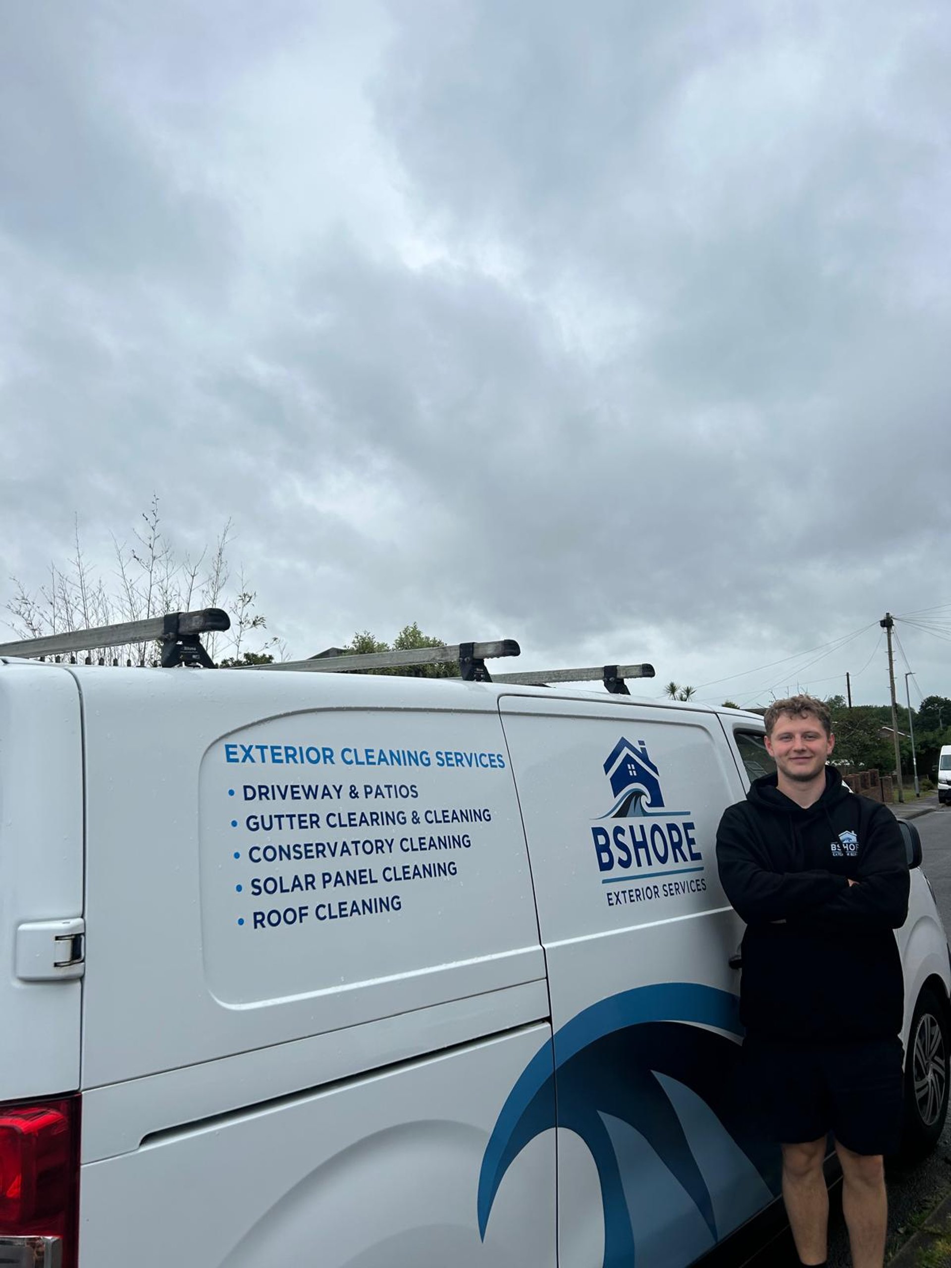 black and brown leather padded tub sofa