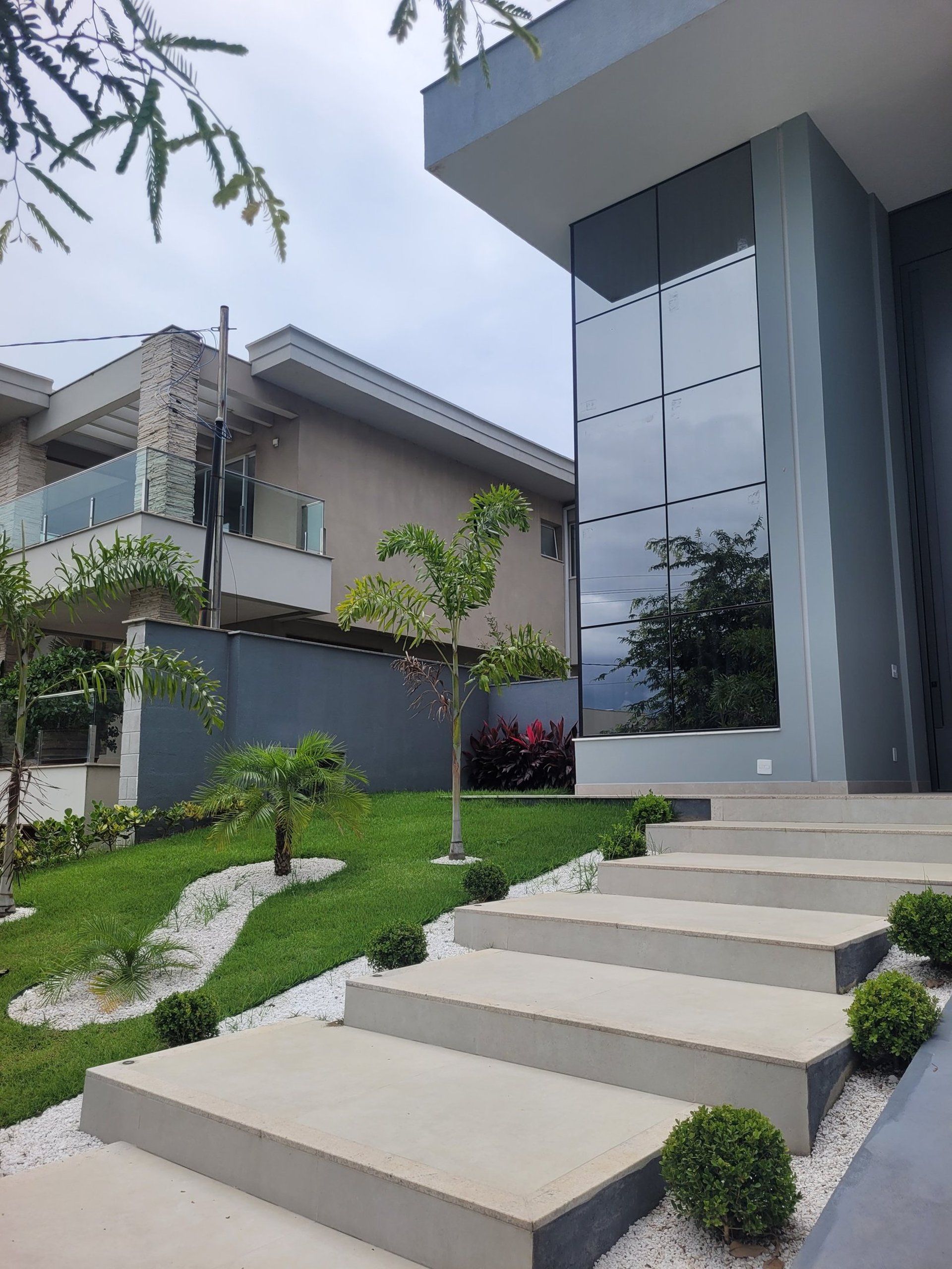woman wearing yellow long-sleeved dress under white clouds and blue sky during daytime