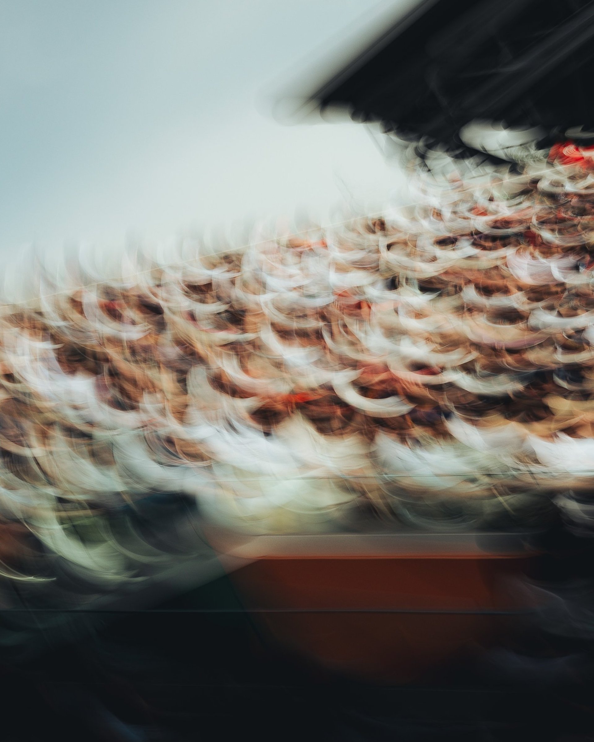 woman wearing yellow long-sleeved dress under white clouds and blue sky during daytime