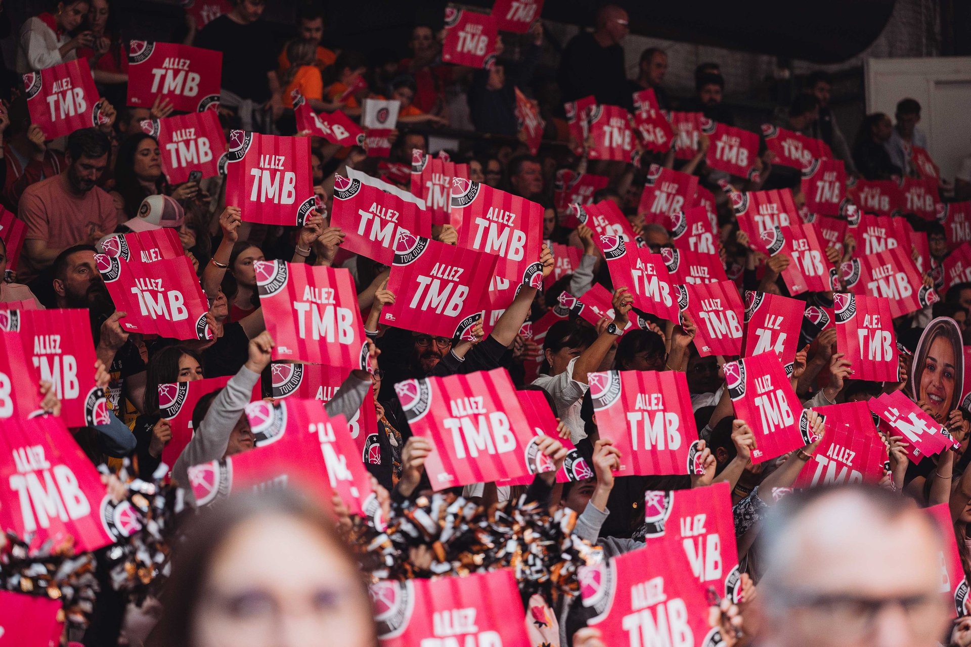 an abstract photo of a curved building with a blue sky in the background