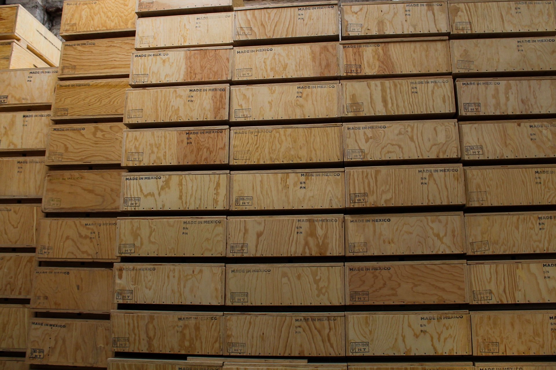 an abstract photo of a curved building with a blue sky in the background