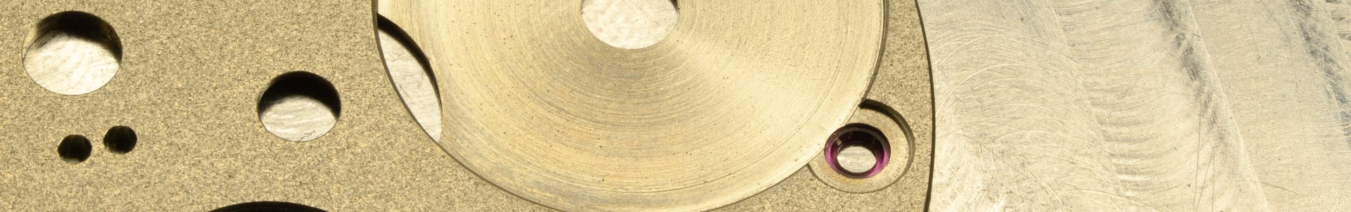 an abstract photo of a curved building with a blue sky in the background