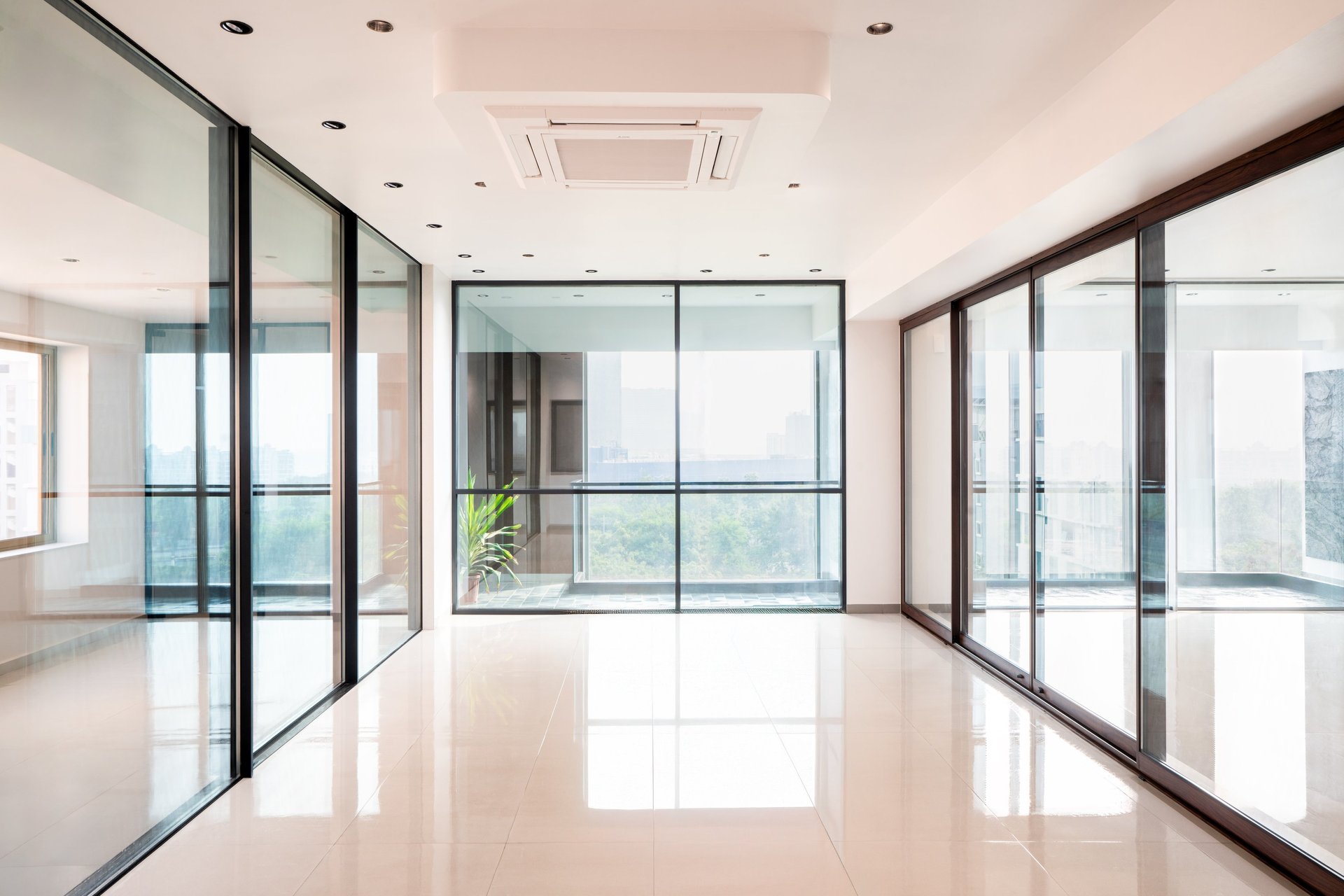 an abstract photo of a curved building with a blue sky in the background