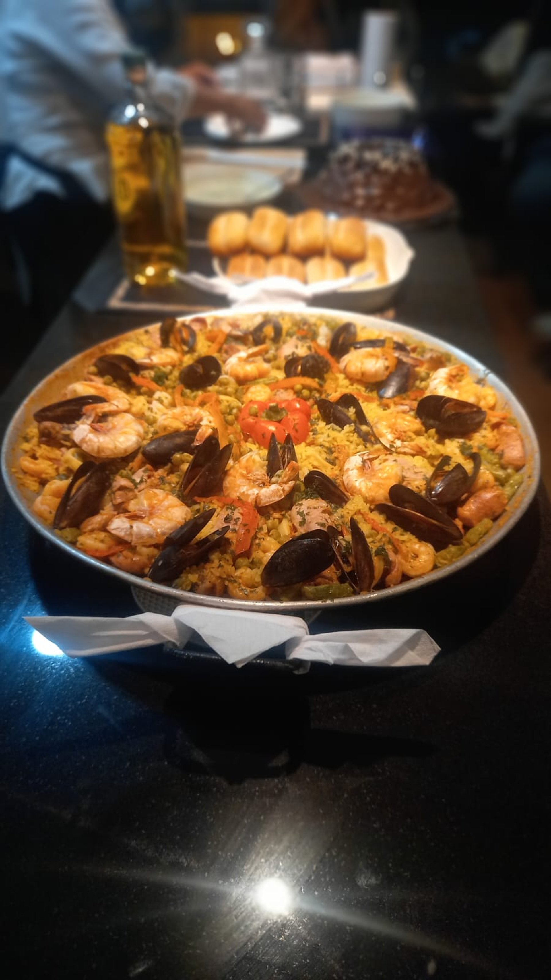 woman wearing yellow long-sleeved dress under white clouds and blue sky during daytime