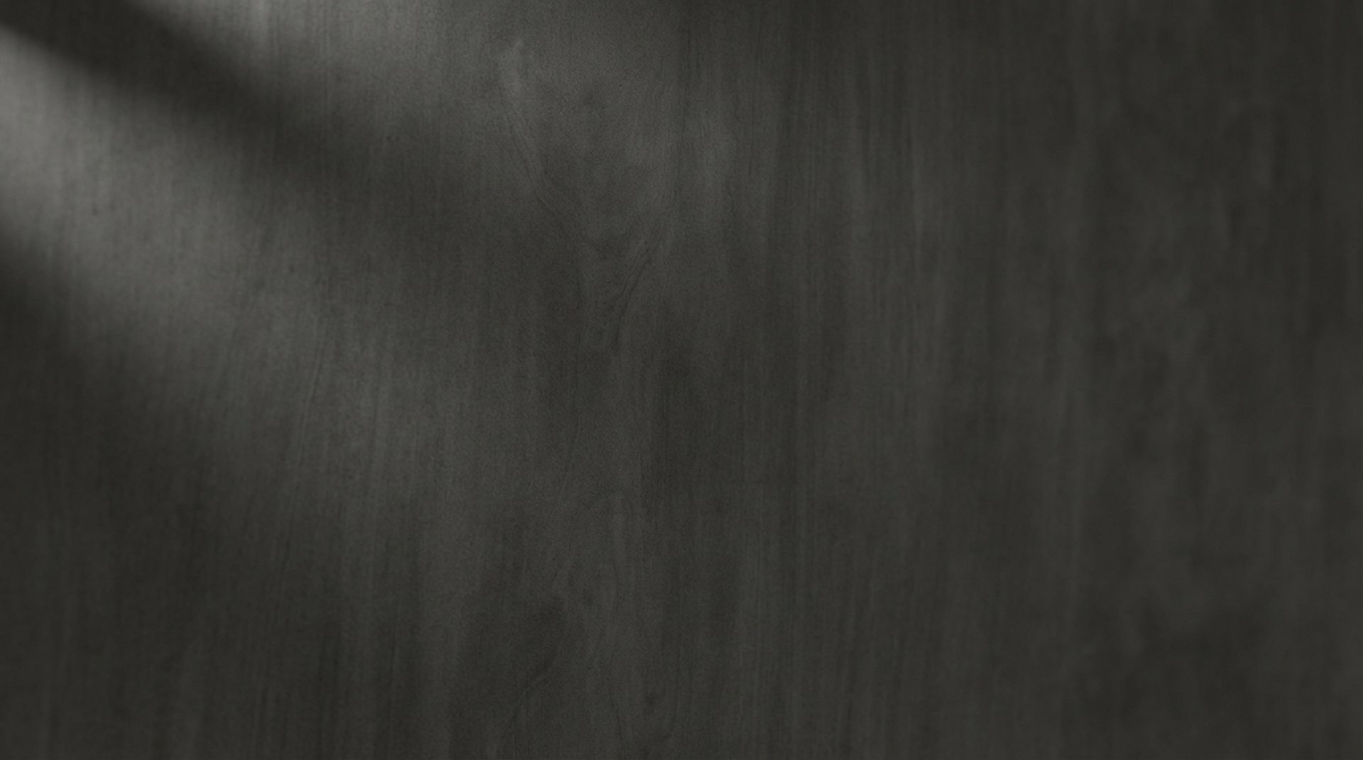 a black and white photo of a white wall