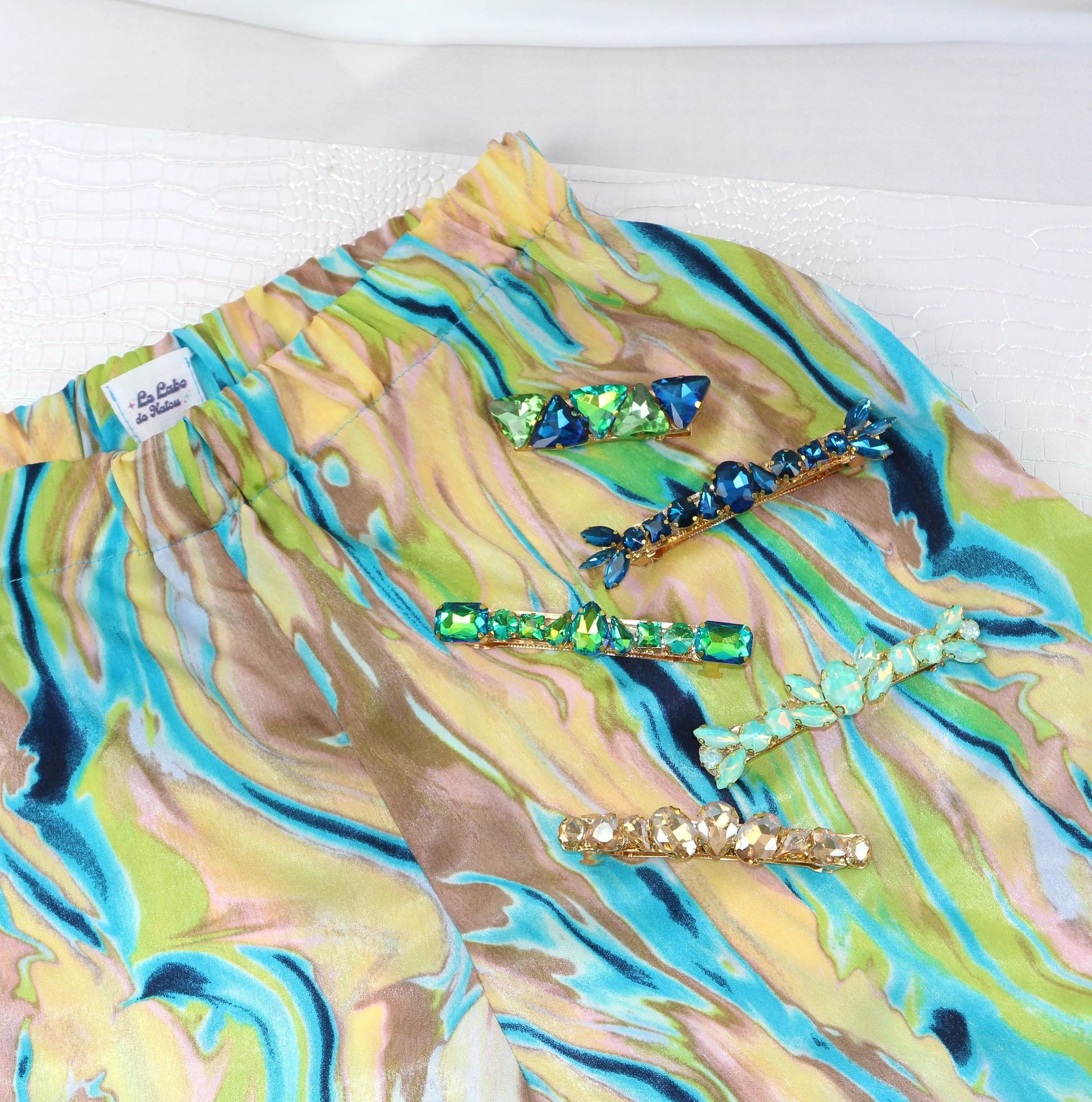 red textile on white textile