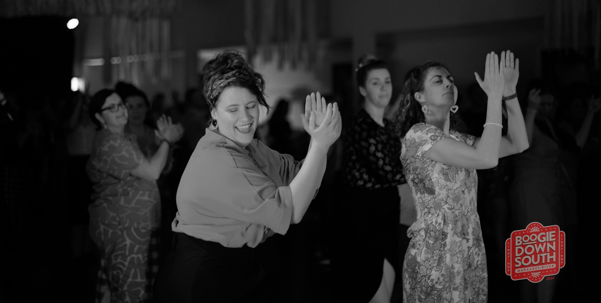 an abstract photo of a curved building with a blue sky in the background
