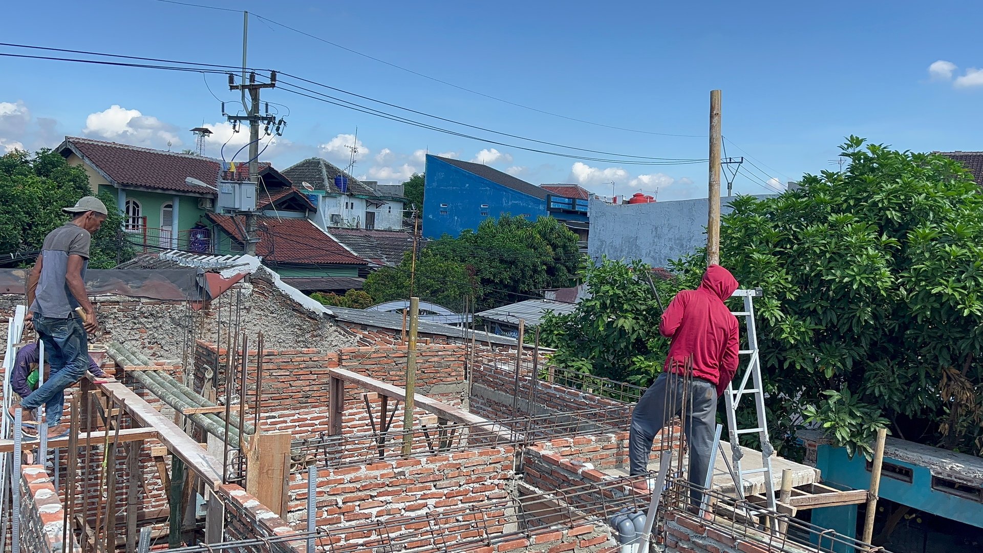 woman wearing yellow long-sleeved dress under white clouds and blue sky during daytime