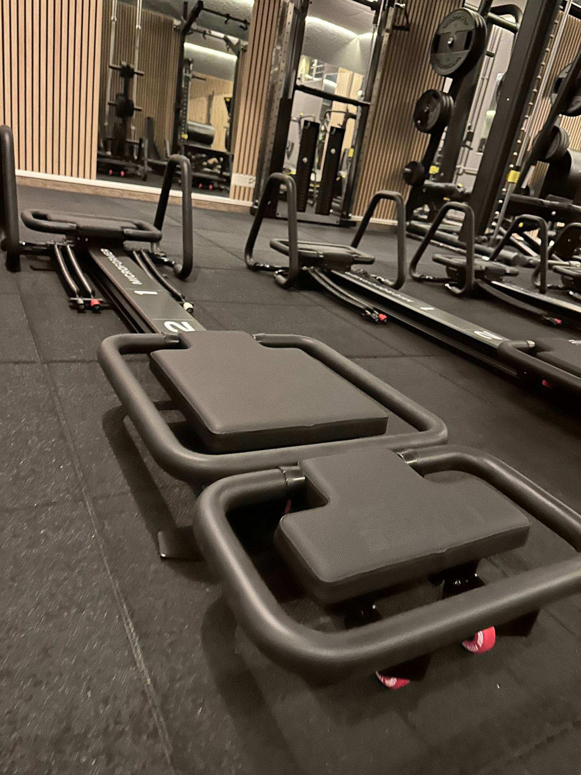 an abstract photo of a curved building with a blue sky in the background