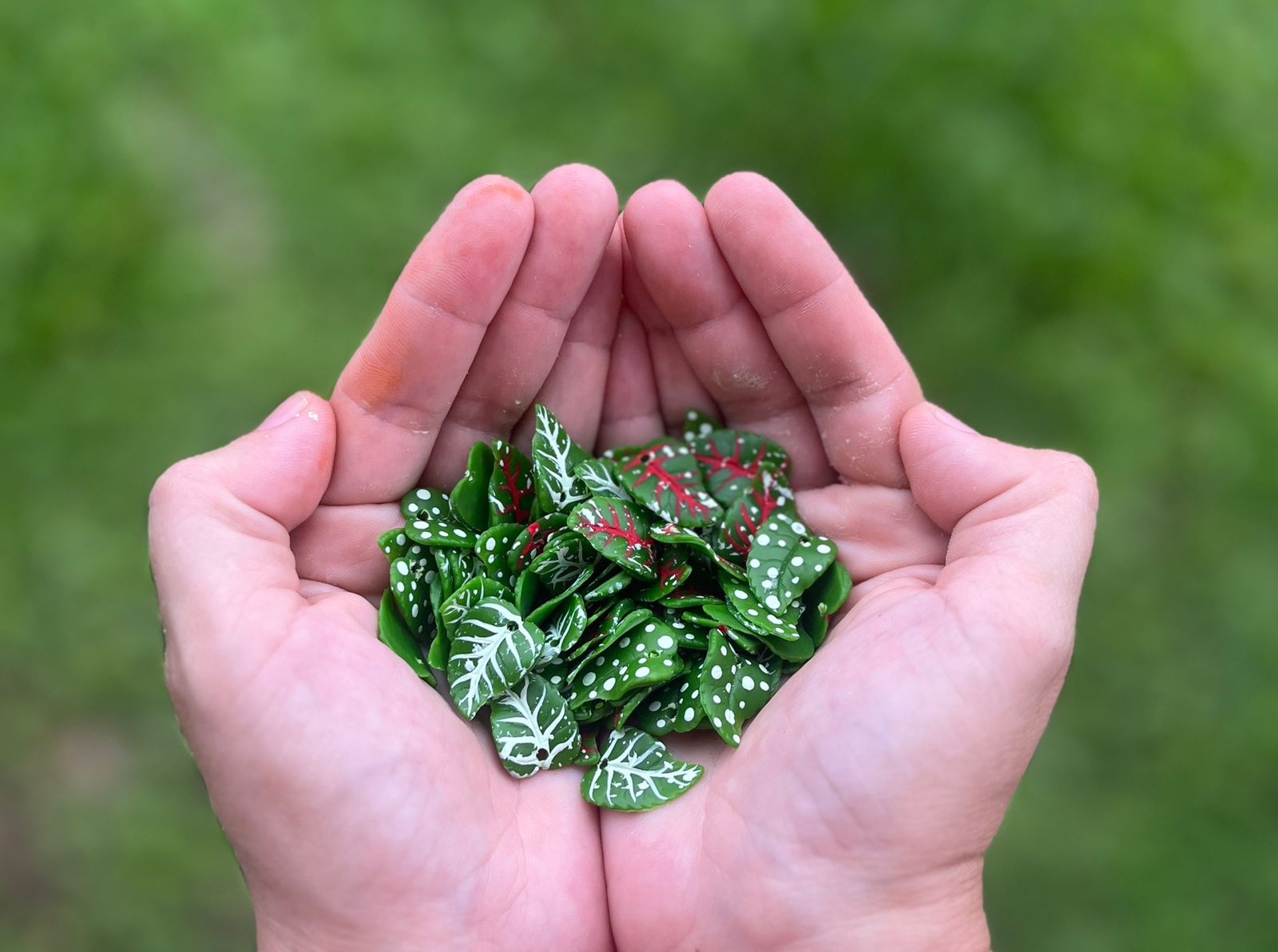 woman in white and brown dress standing on green grass during night time