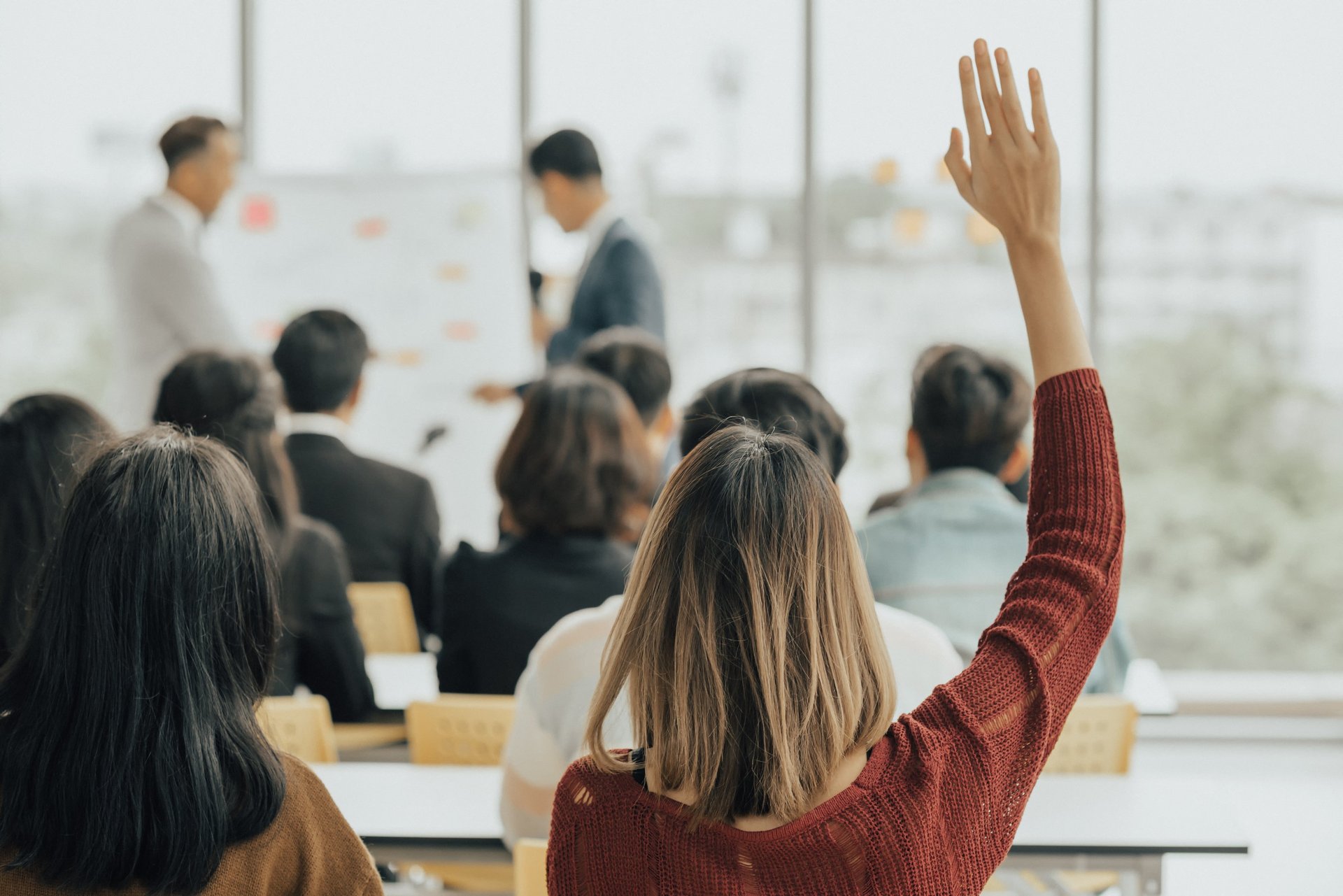 an abstract photo of a curved building with a blue sky in the background