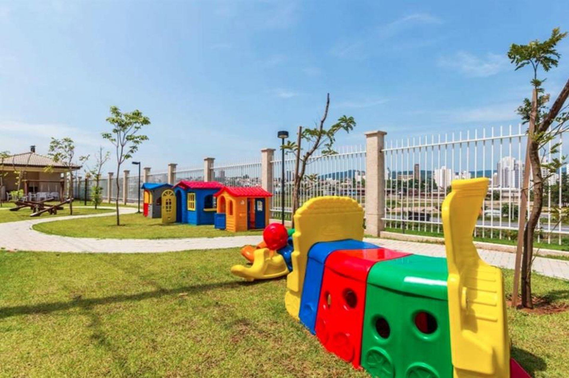 an abstract photo of a curved building with a blue sky in the background