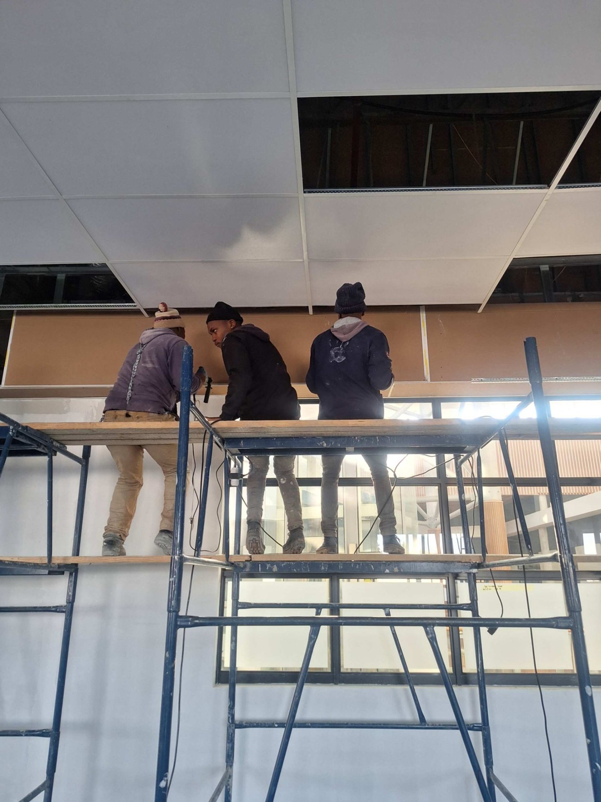 Supervising Bulkhead installation for suspended ceiling, Belair Shopping Centre