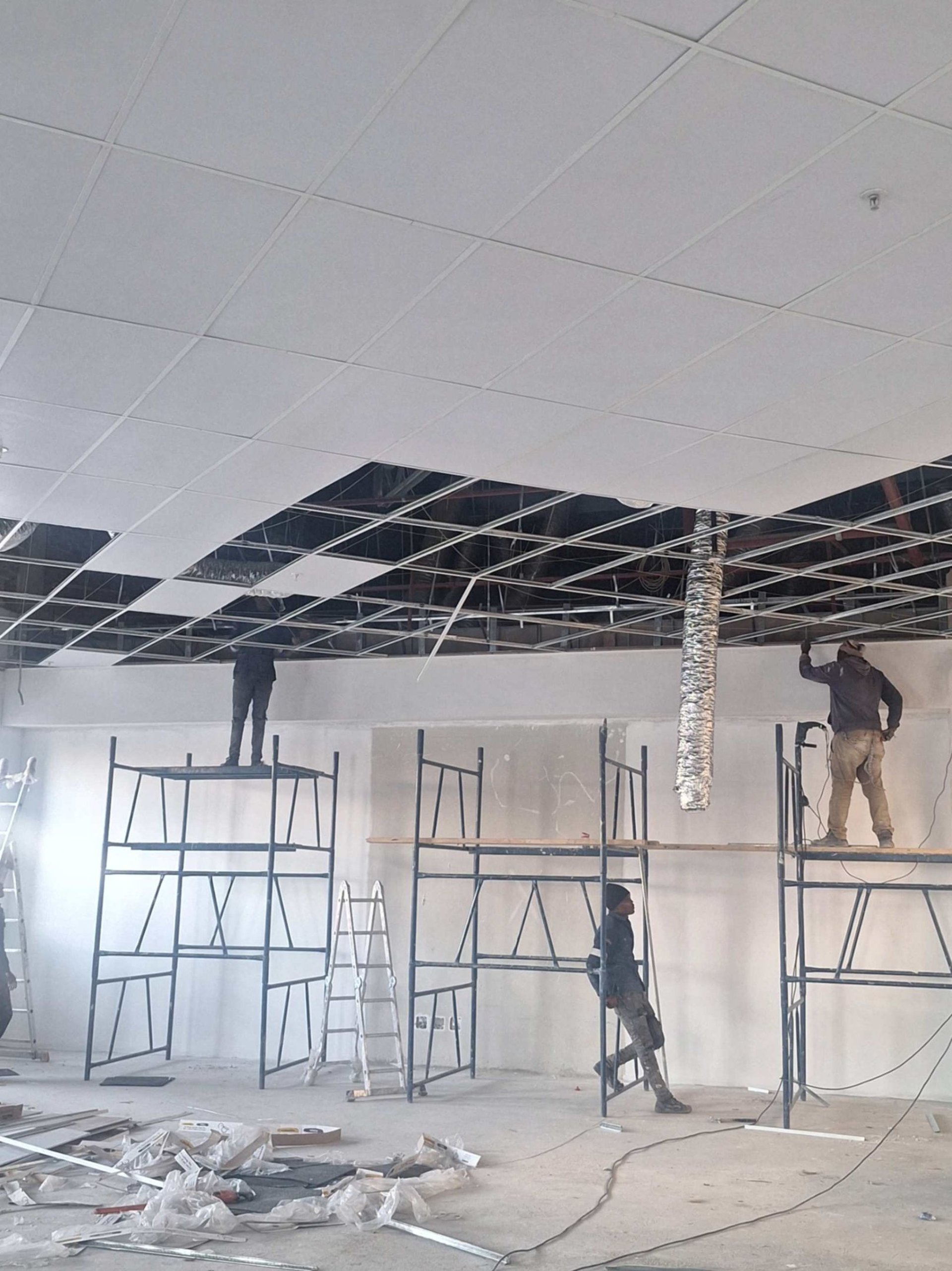 Inspection of suspended ceiling level for commercial renovation project, Belair Shopping Centre, North Riding, Johannesburg