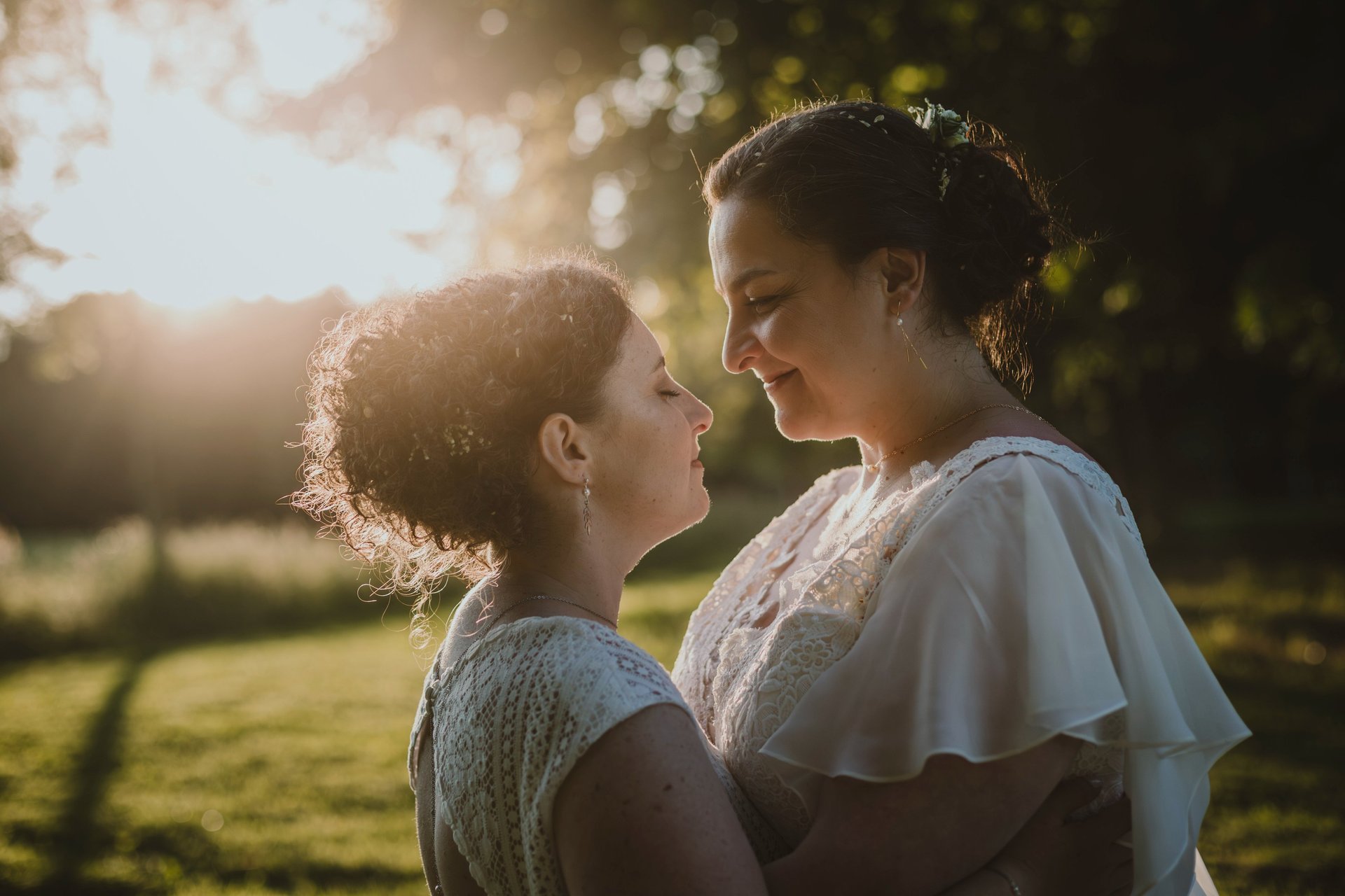 an abstract photo of a curved building with a blue sky in the background