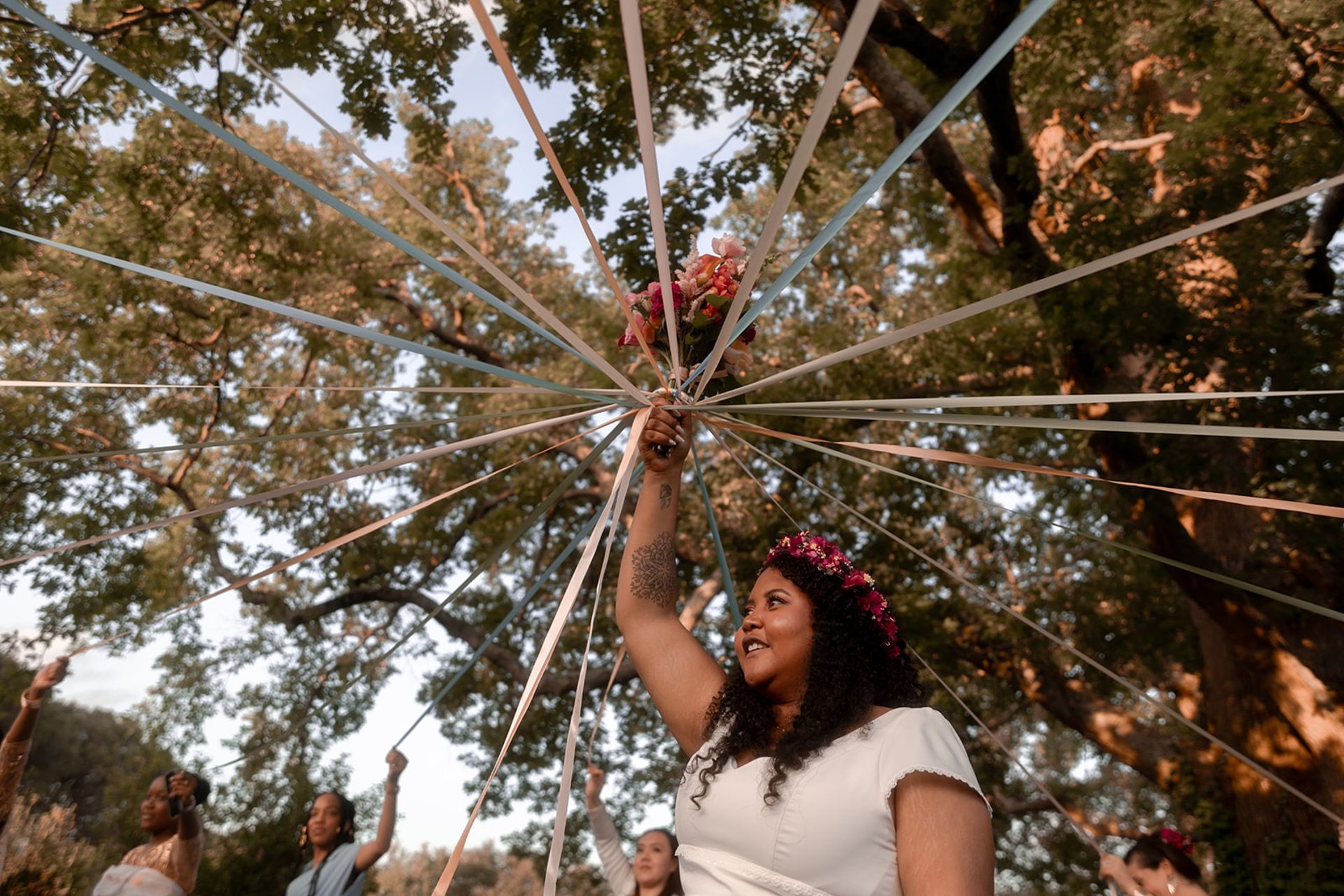 an abstract photo of a curved building with a blue sky in the background