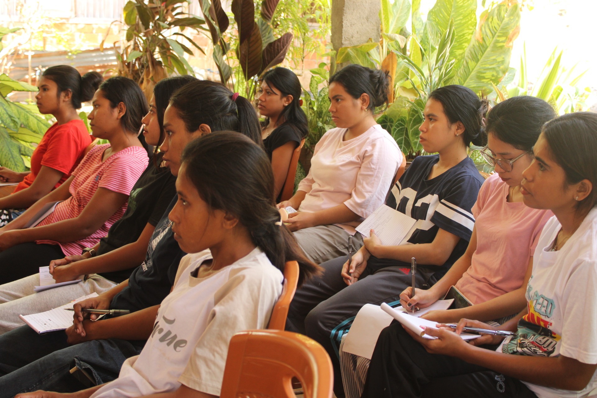 an abstract photo of a curved building with a blue sky in the background