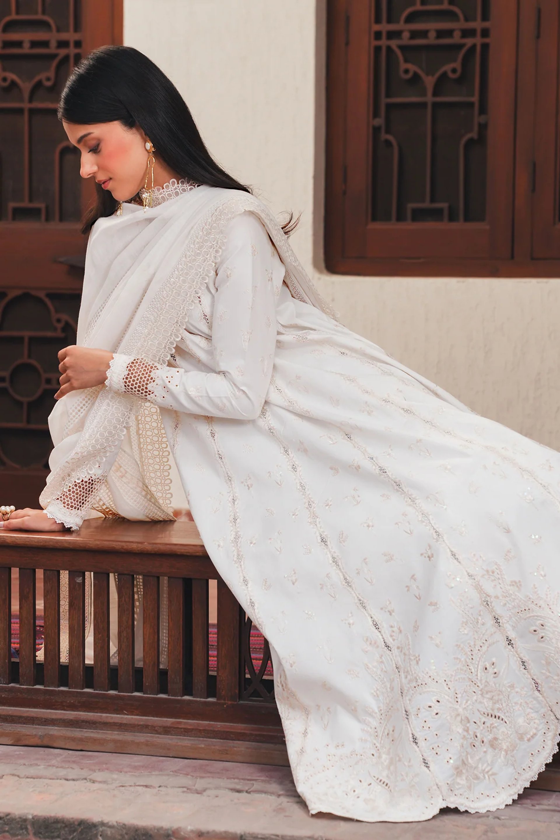 person wearing grey knit sweater