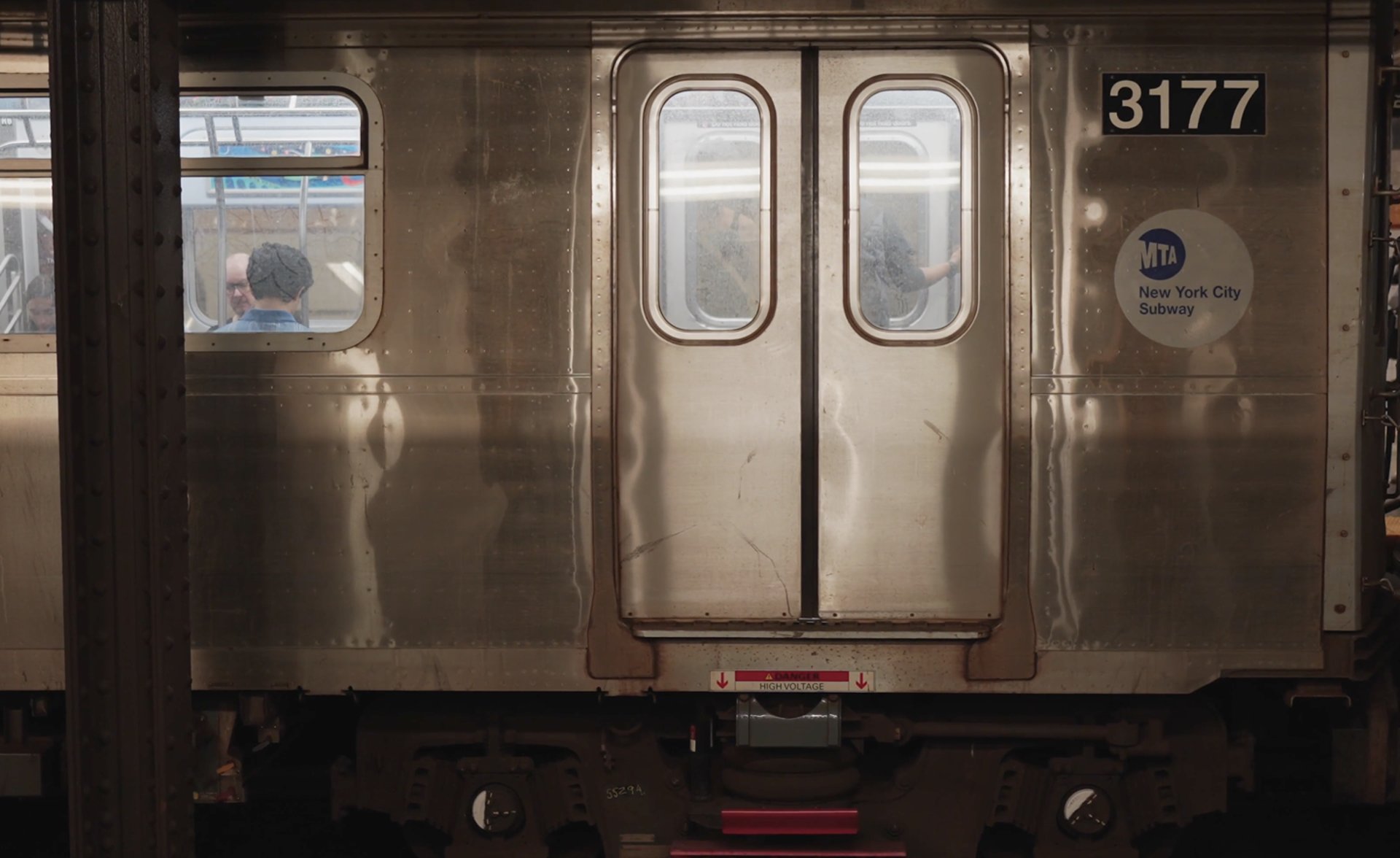a close up of a black and brown abstract painting
