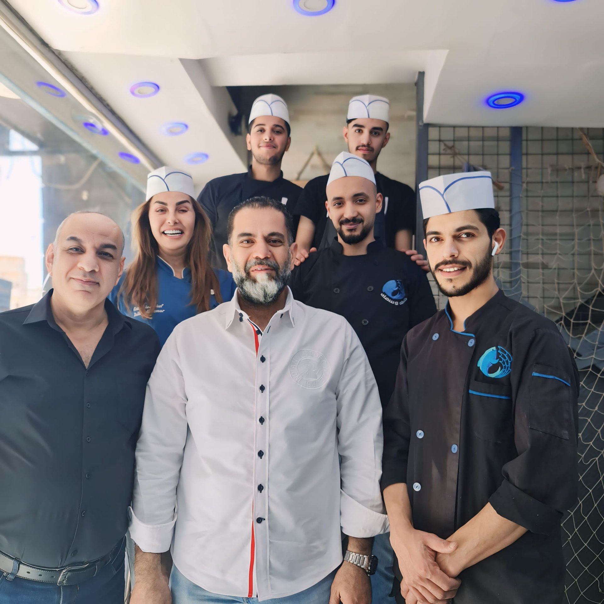 woman wearing yellow long-sleeved dress under white clouds and blue sky during daytime