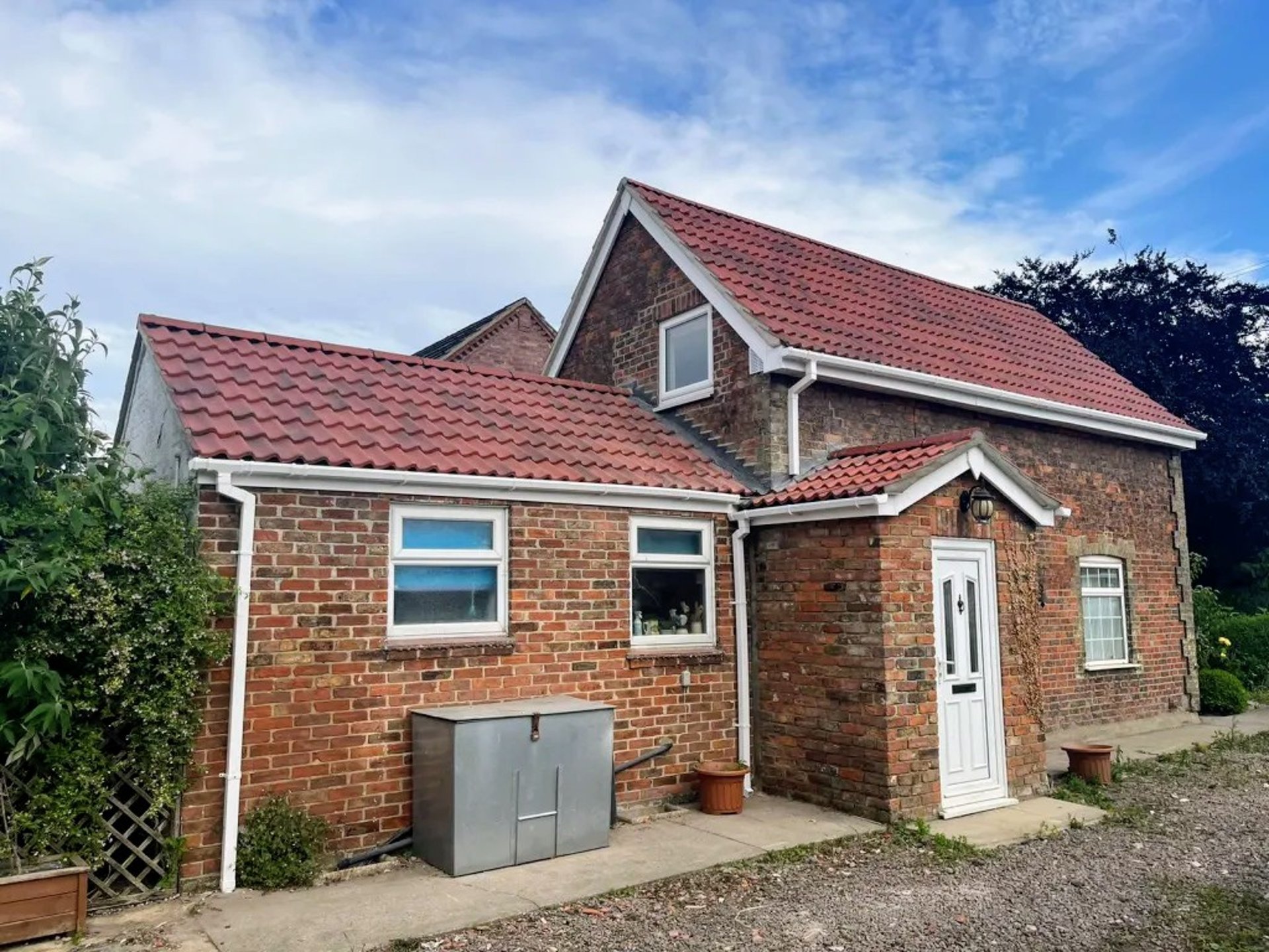 black and brown leather padded tub sofa