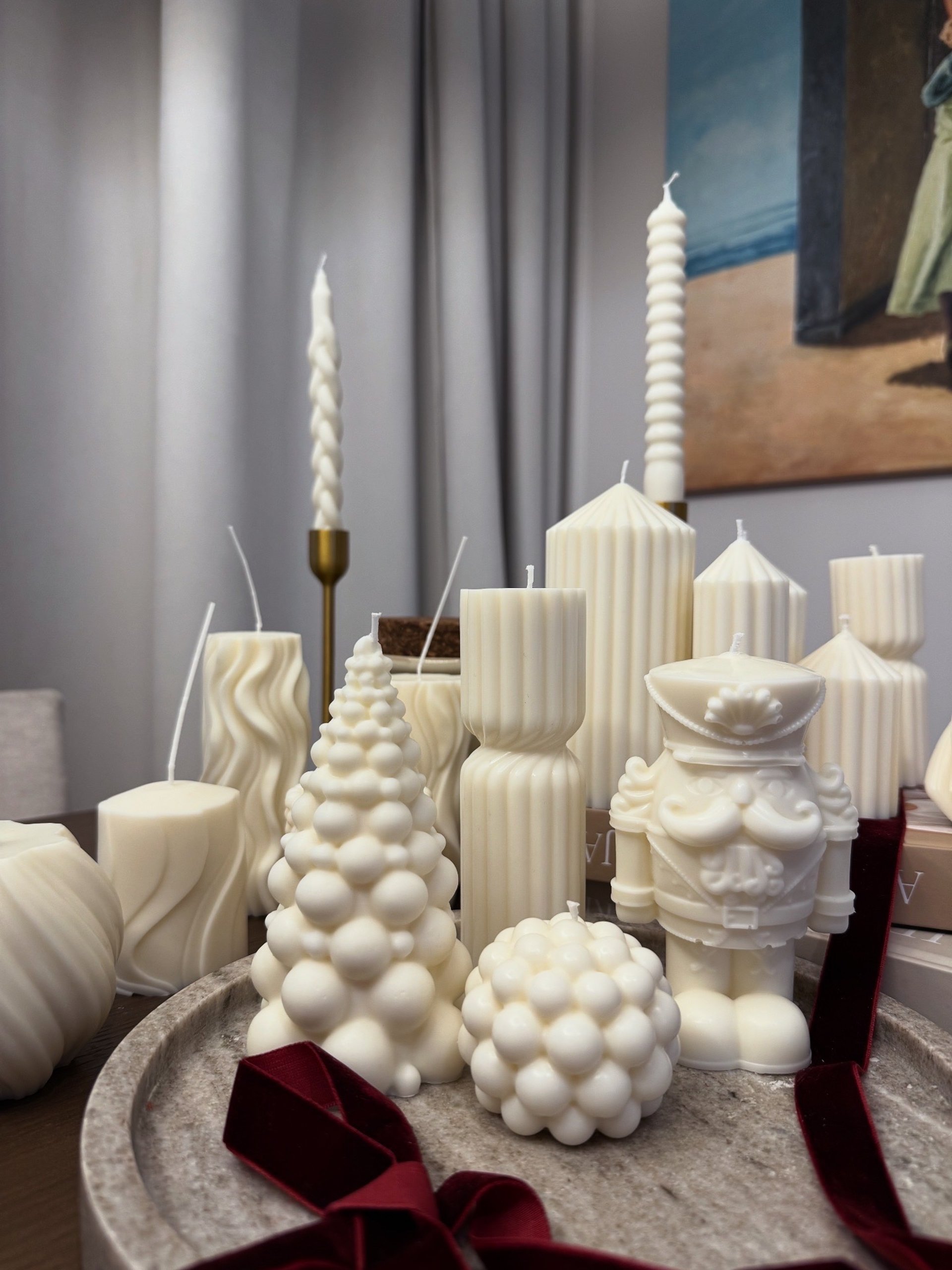 white pillar candle on brown round cake