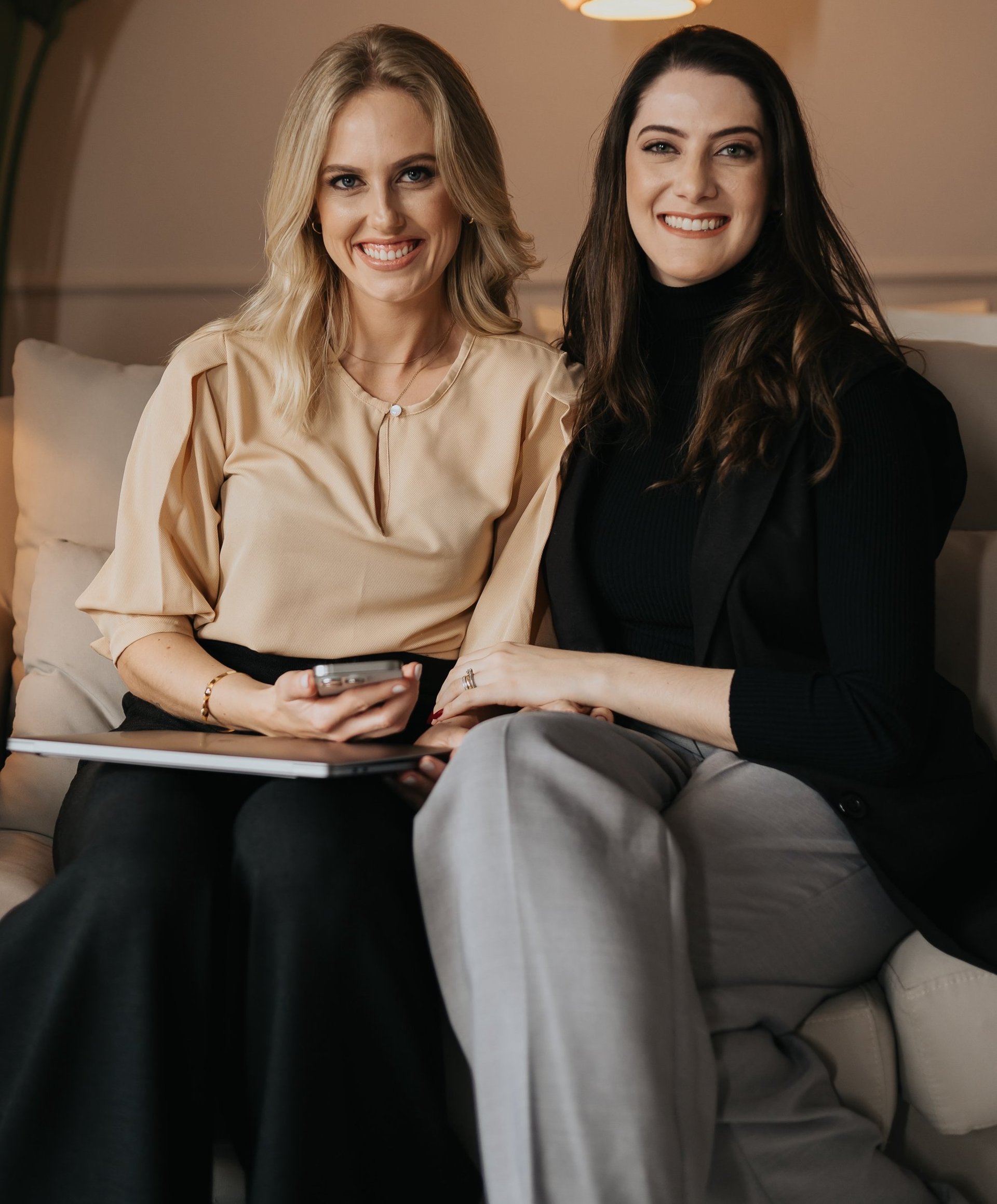 an abstract photo of a curved building with a blue sky in the background