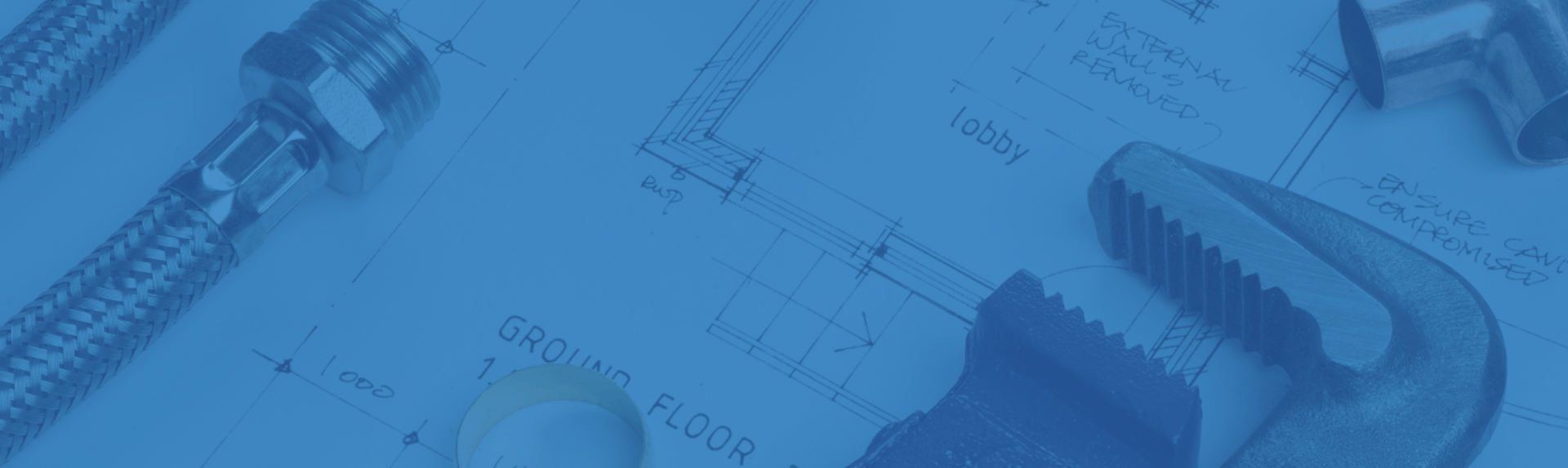 an abstract photo of a curved building with a blue sky in the background