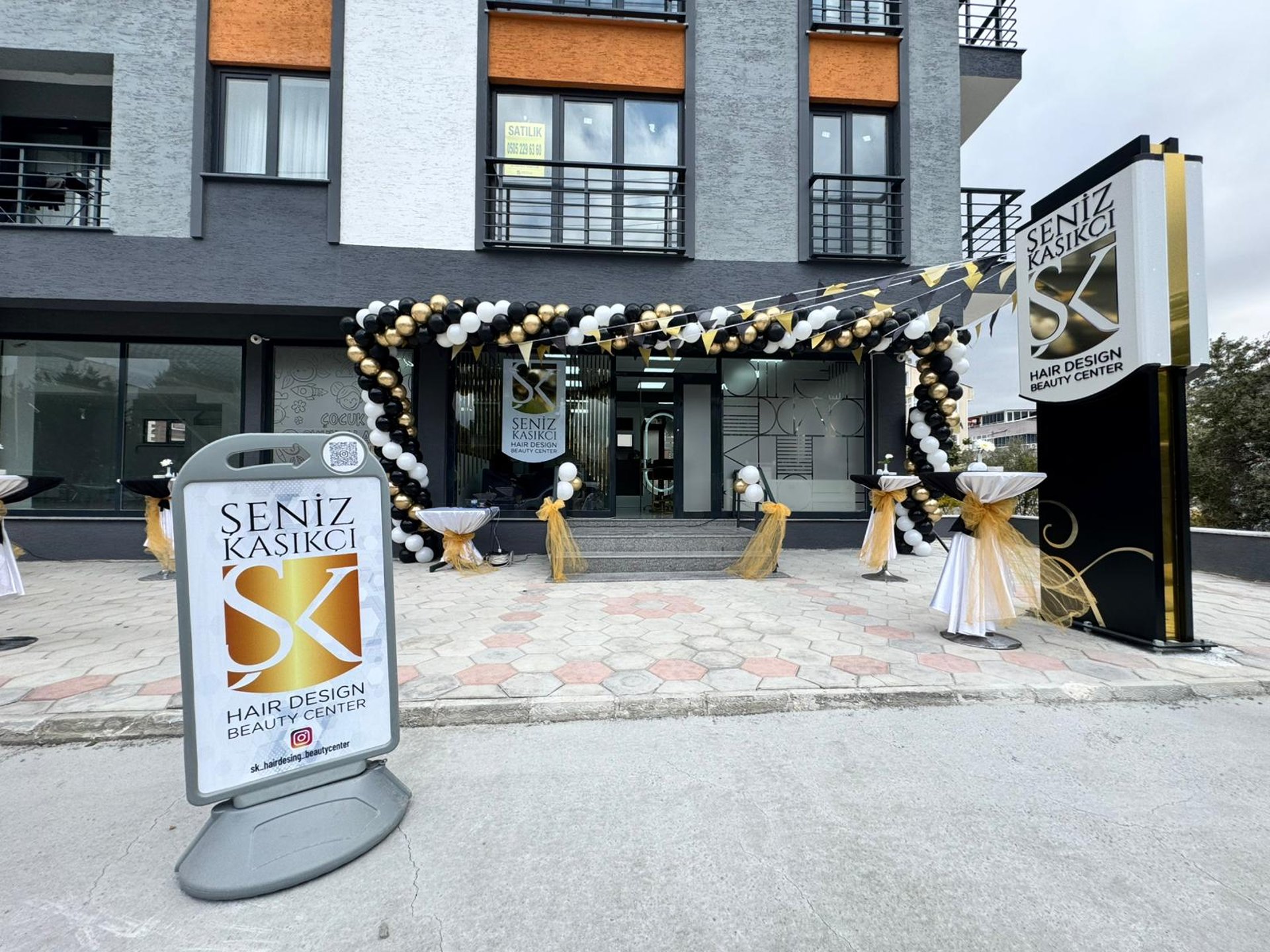 black and brown leather padded tub sofa