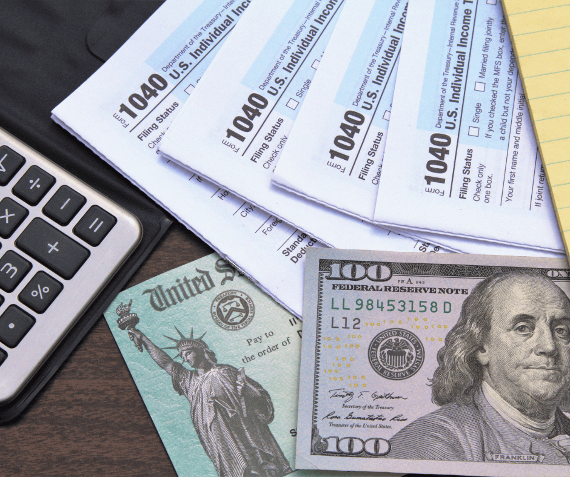 woman wearing yellow long-sleeved dress under white clouds and blue sky during daytime