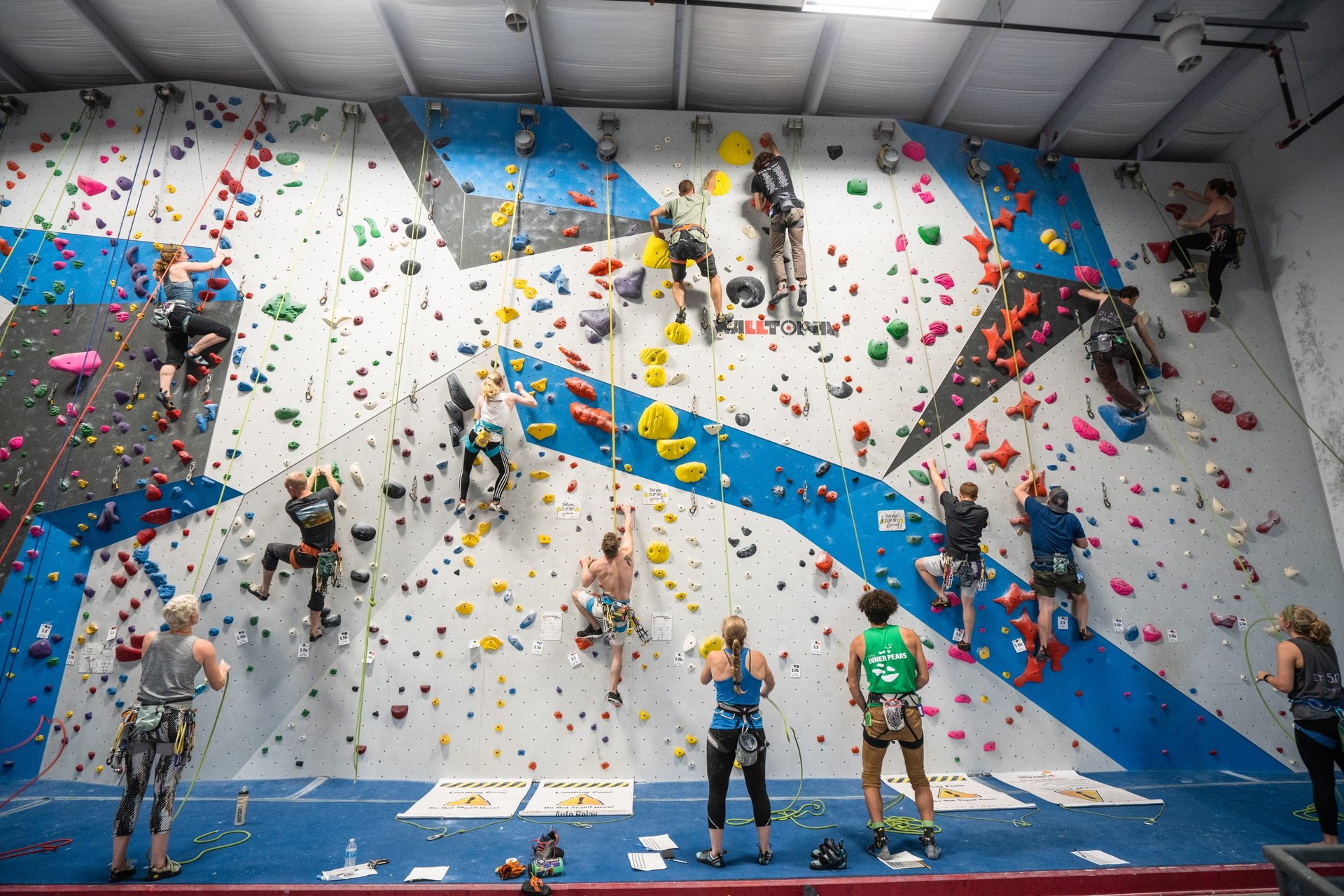 a person riding a go kart in a building