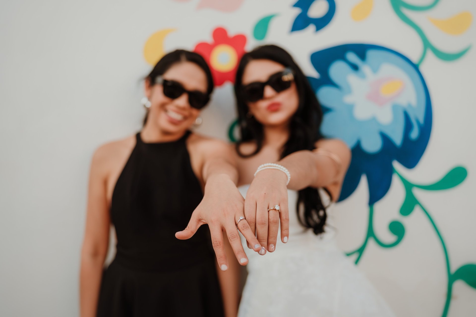 person holding white flower bouquet
