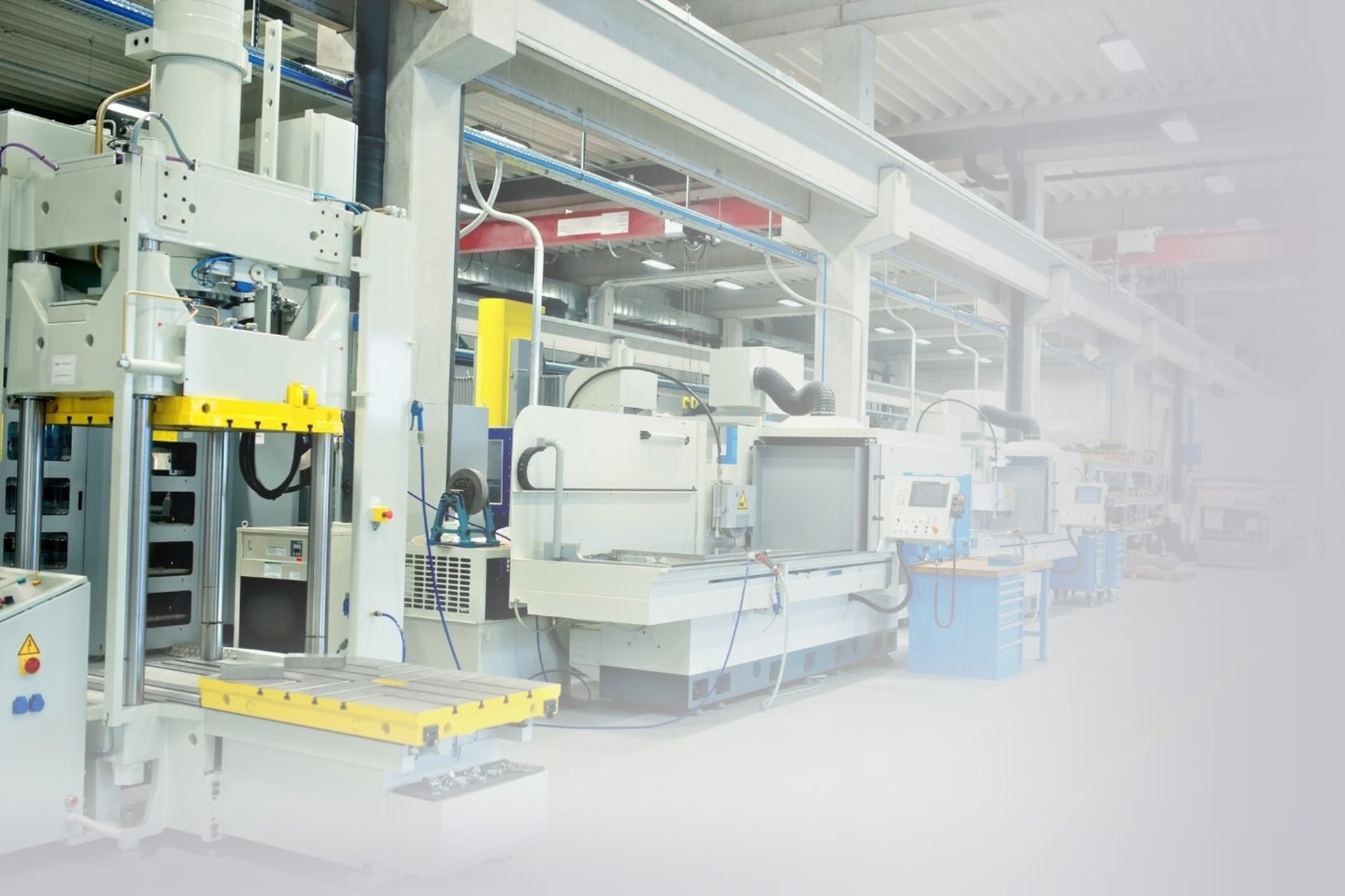 a factory filled with lots of orange machines