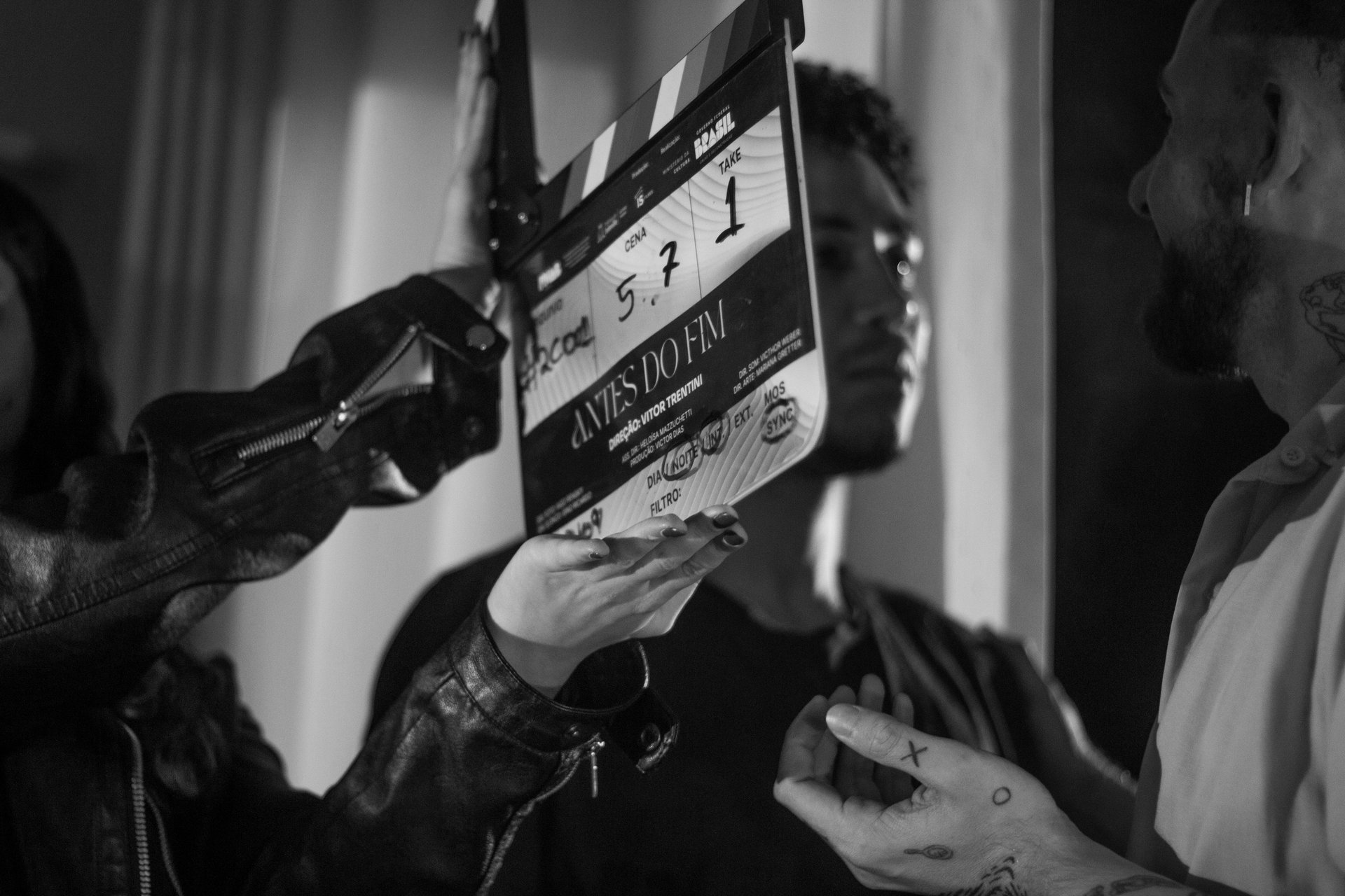 people sitting in a movie theater watching a movie