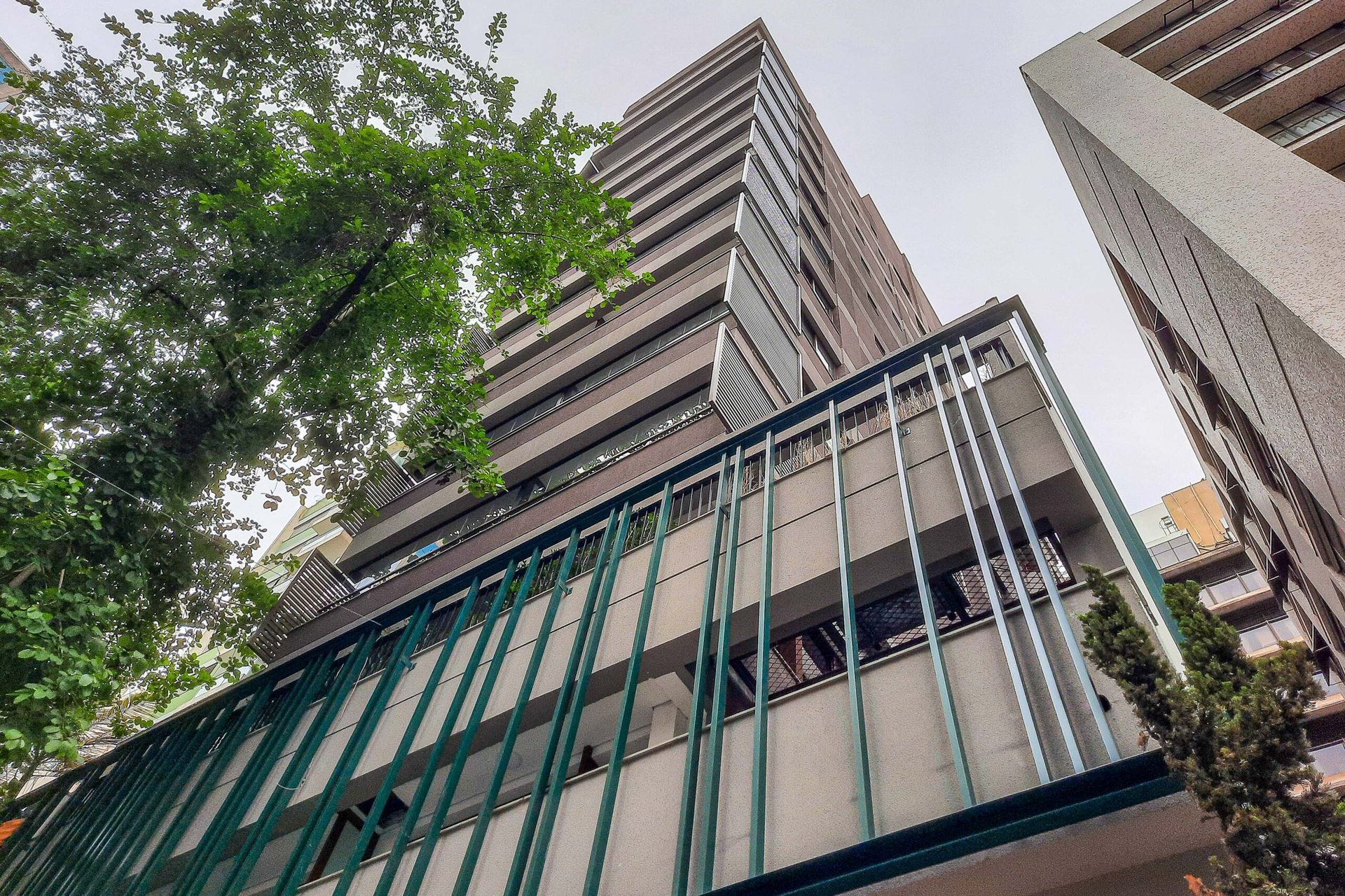 black and brown leather padded tub sofa