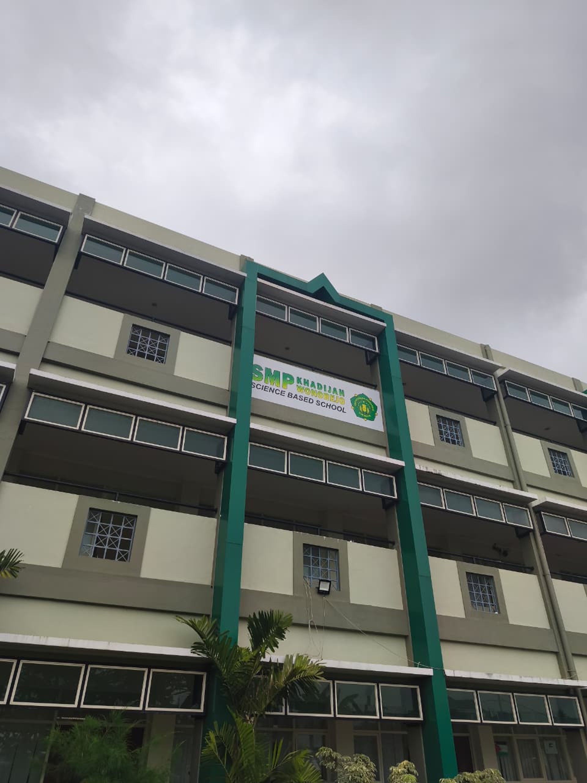 black and brown leather padded tub sofa