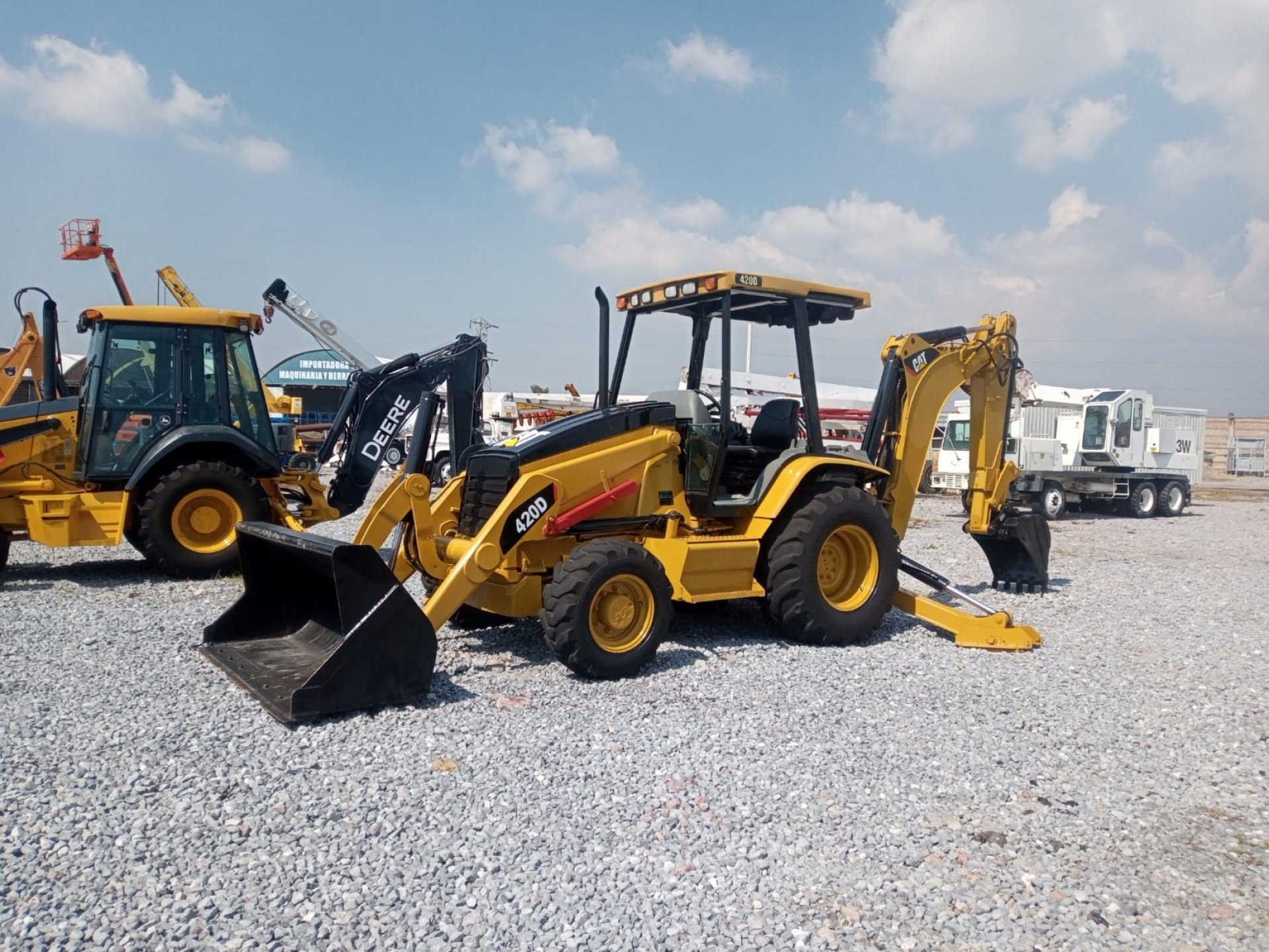 an abstract photo of a curved building with a blue sky in the background