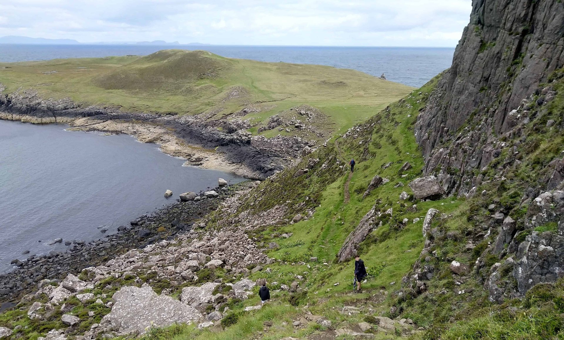 woman wearing yellow long-sleeved dress under white clouds and blue sky during daytime