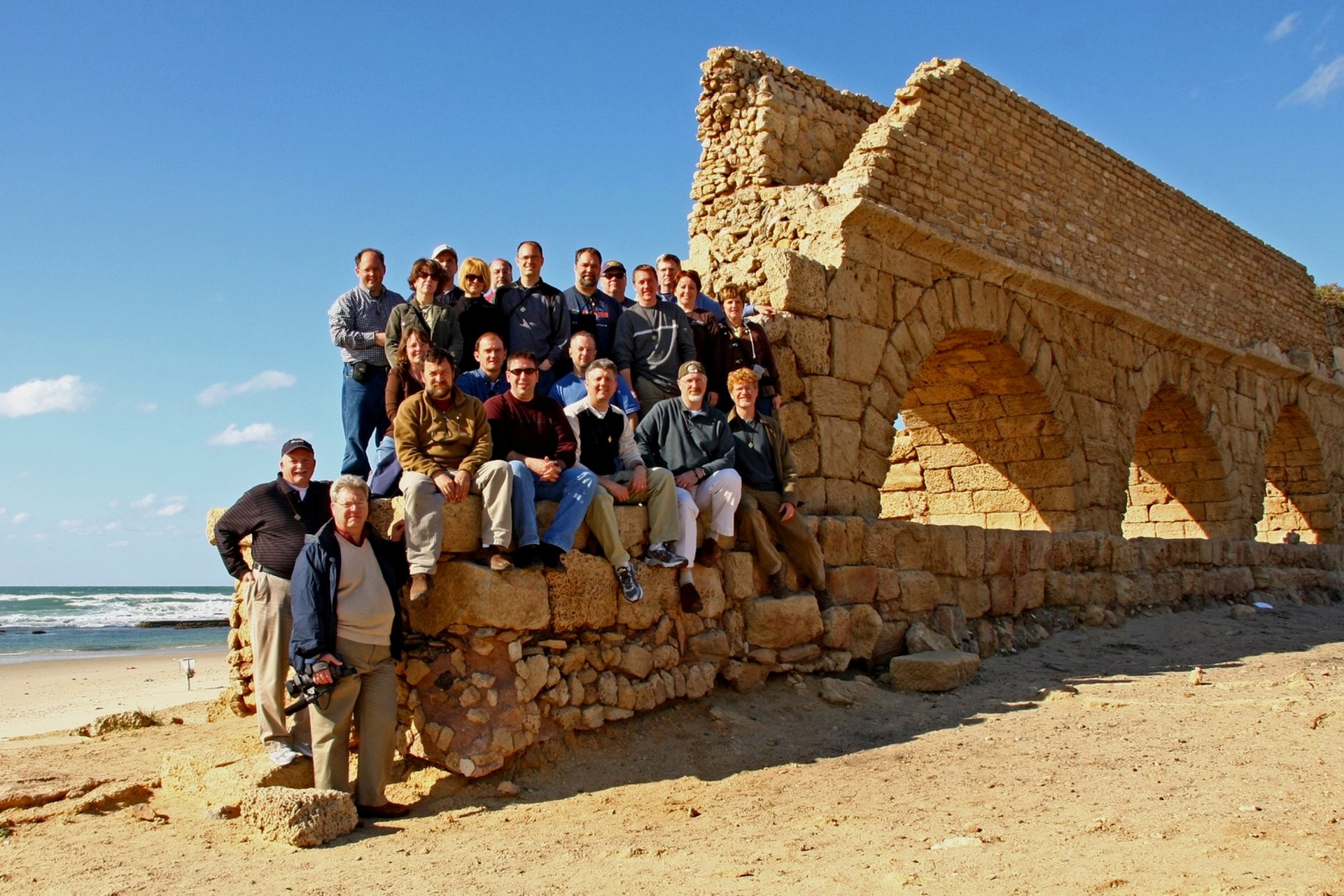 empty hallway between concrete buildings during daytime