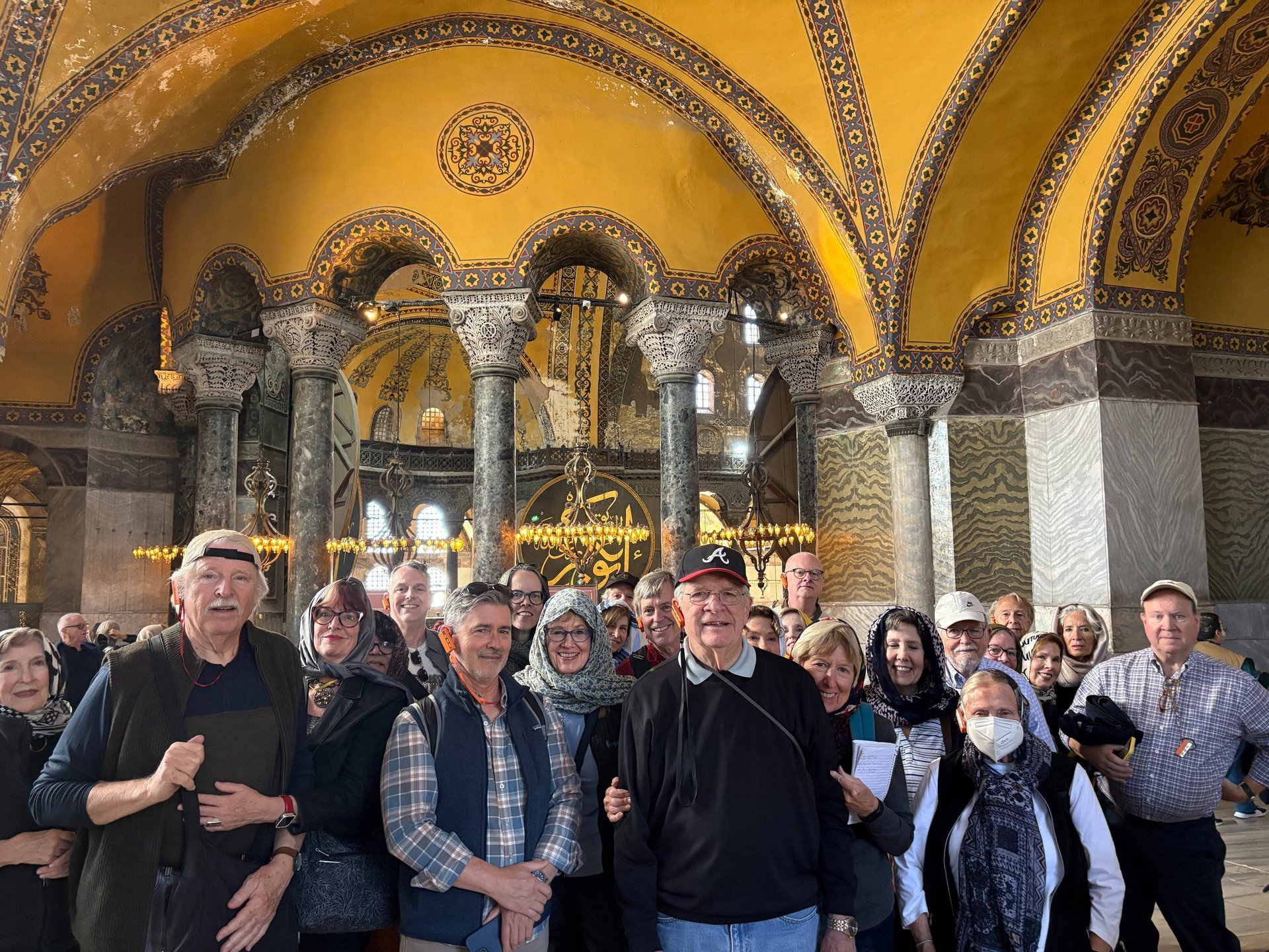 empty hallway between concrete buildings during daytime