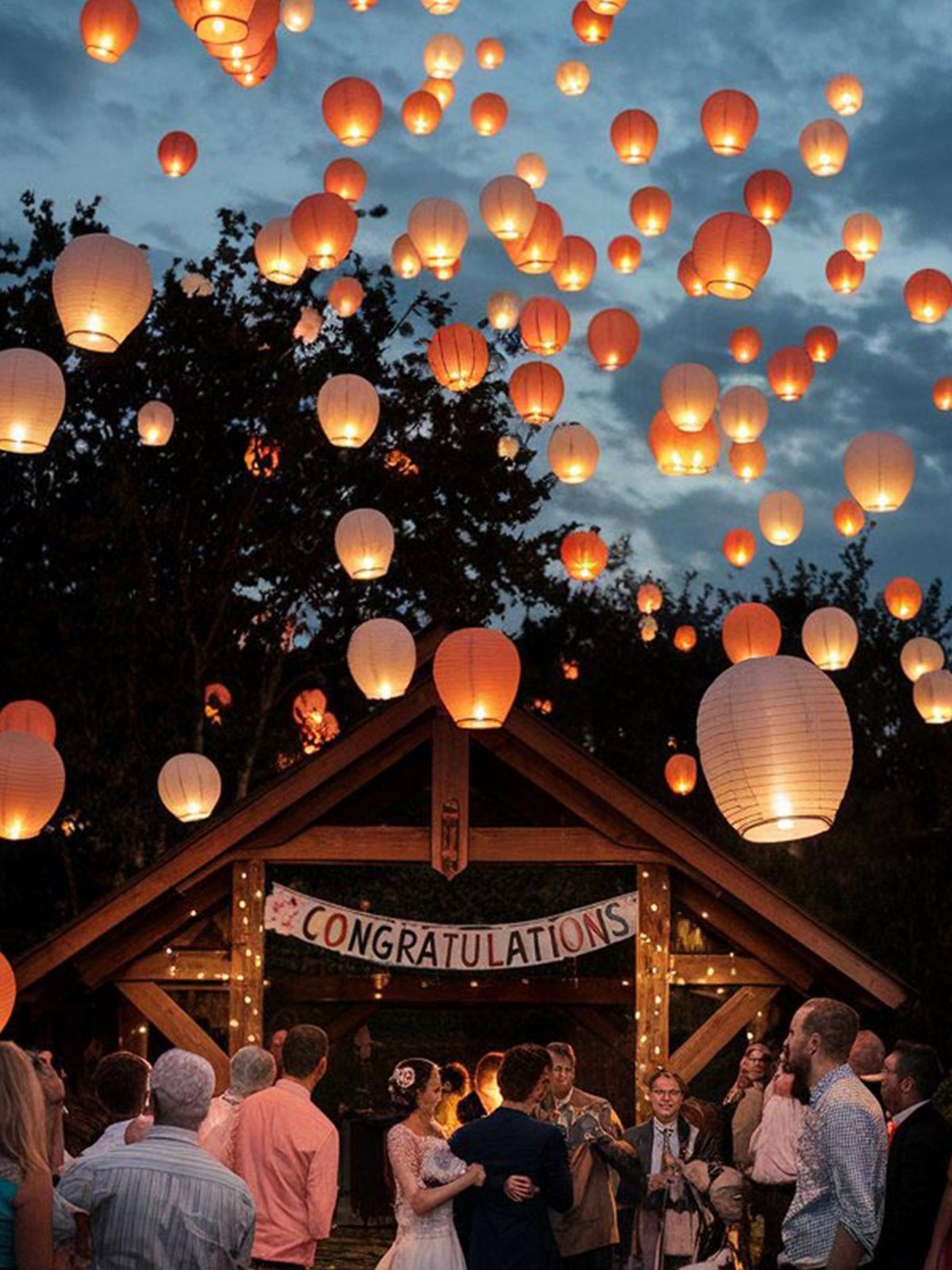 an abstract photo of a curved building with a blue sky in the background