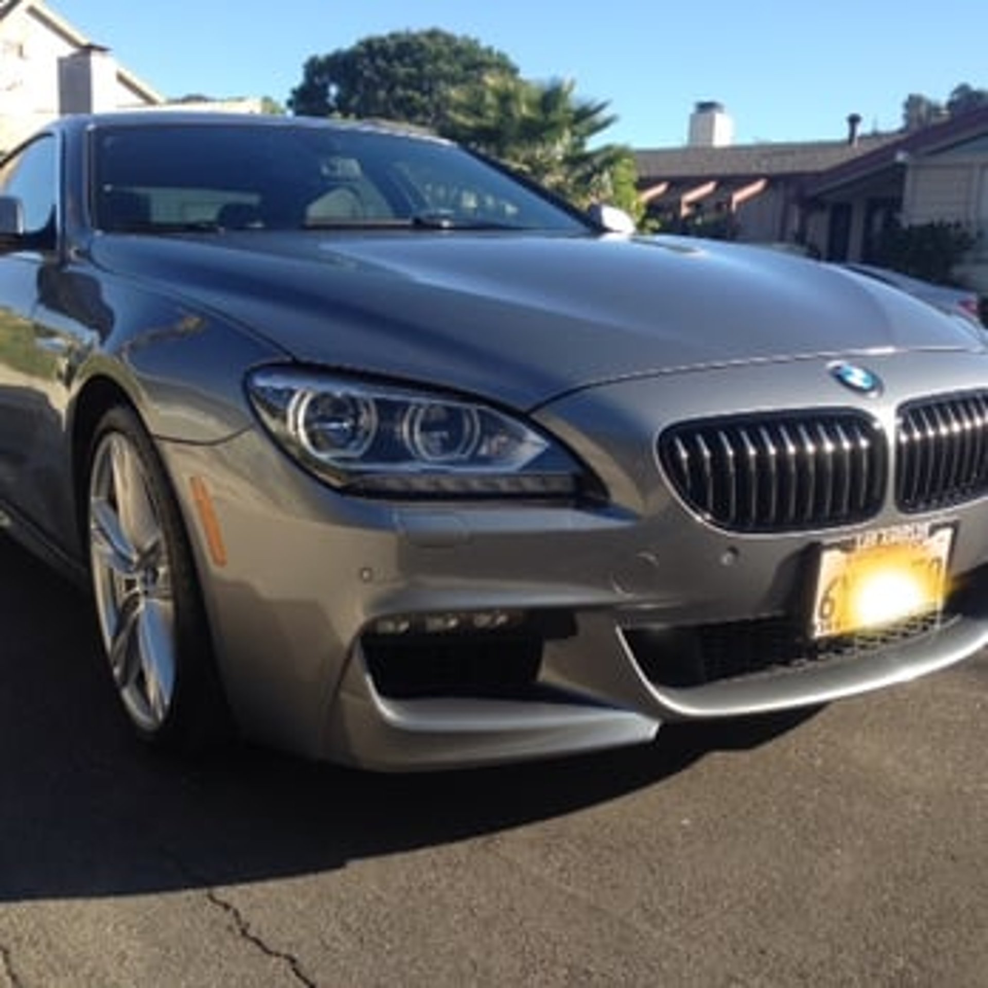 black and brown leather padded tub sofa