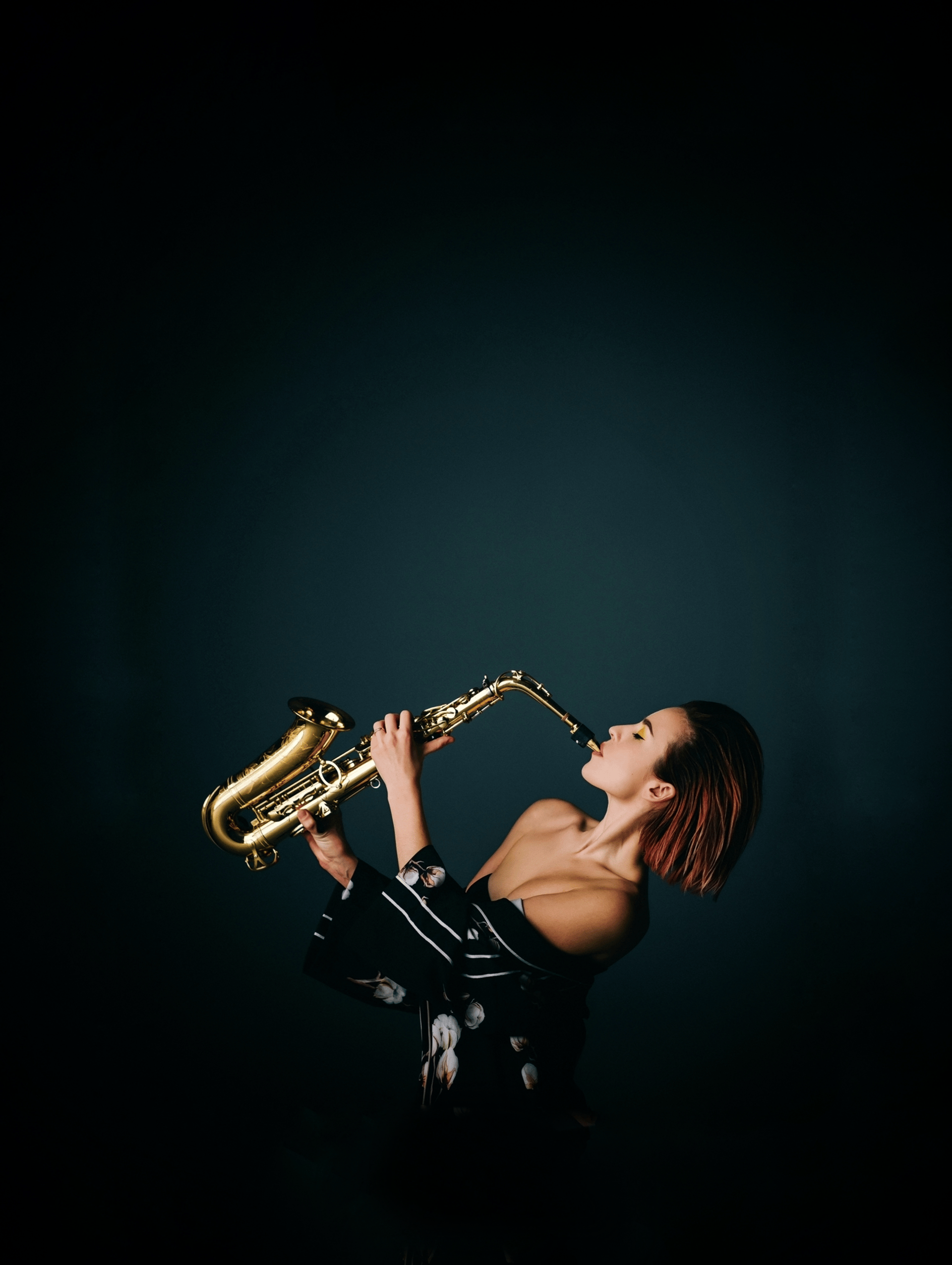black and brown leather padded tub sofa
