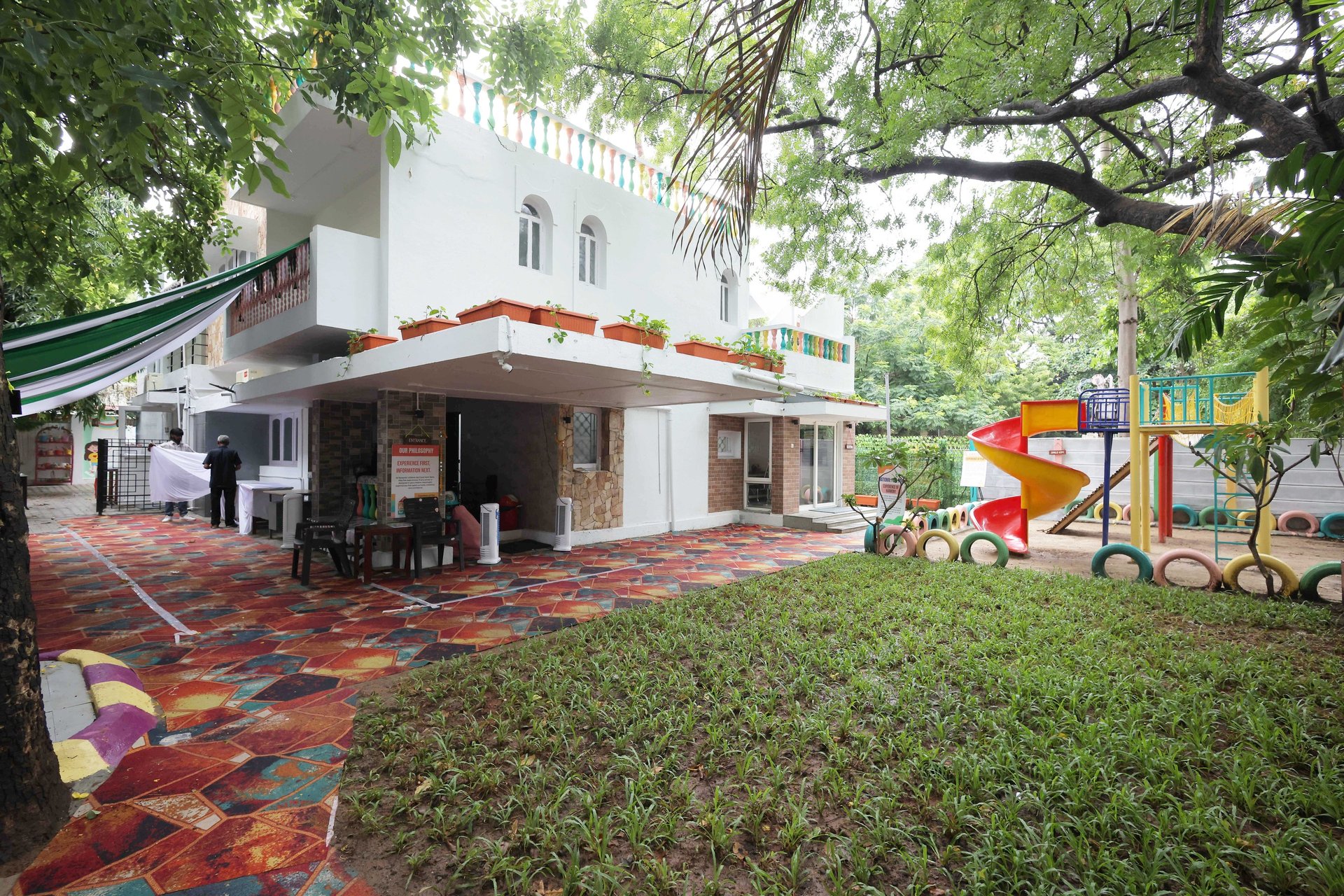 an abstract photo of a curved building with a blue sky in the background