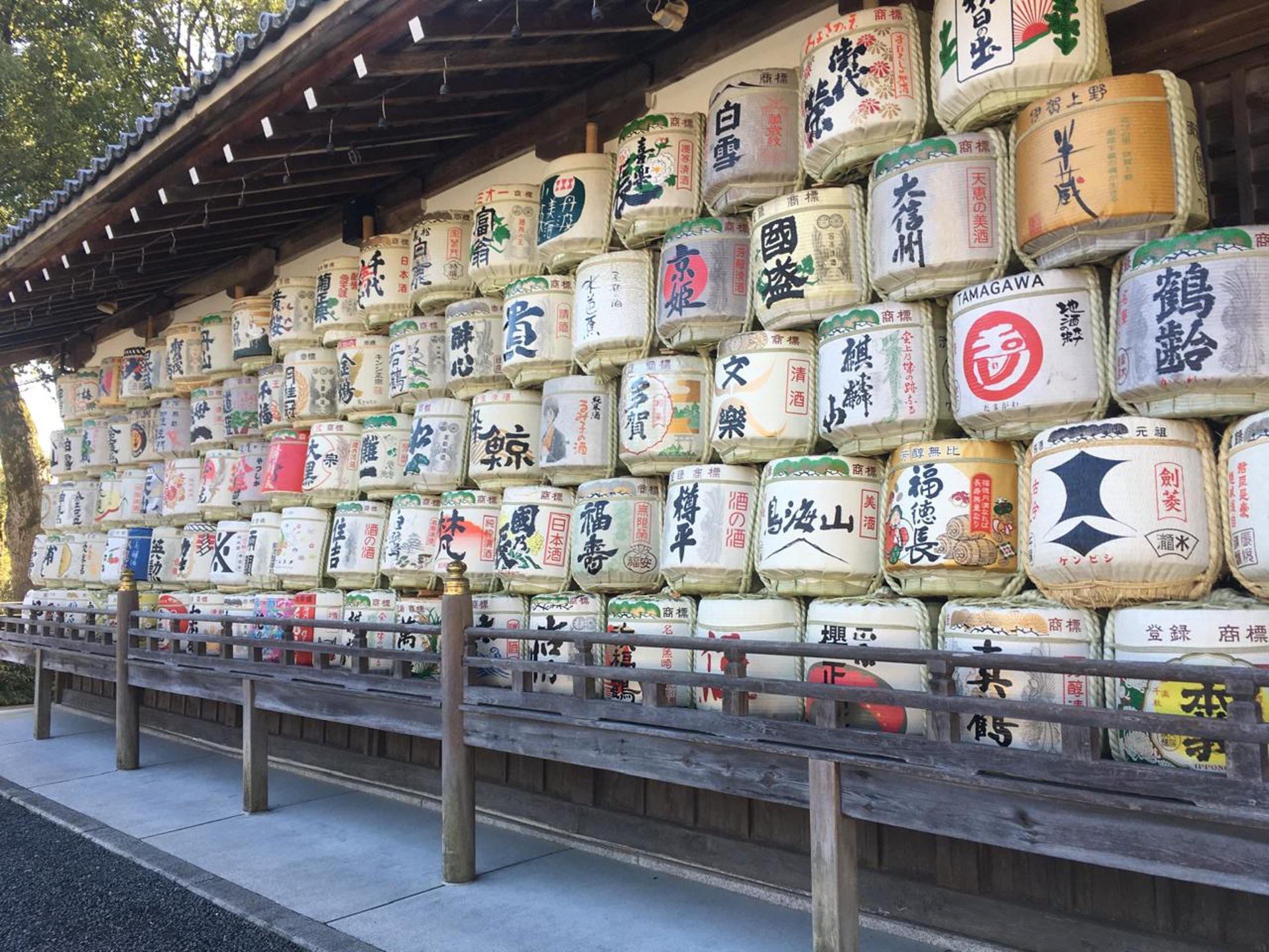 A black and white photo of bottles of wine