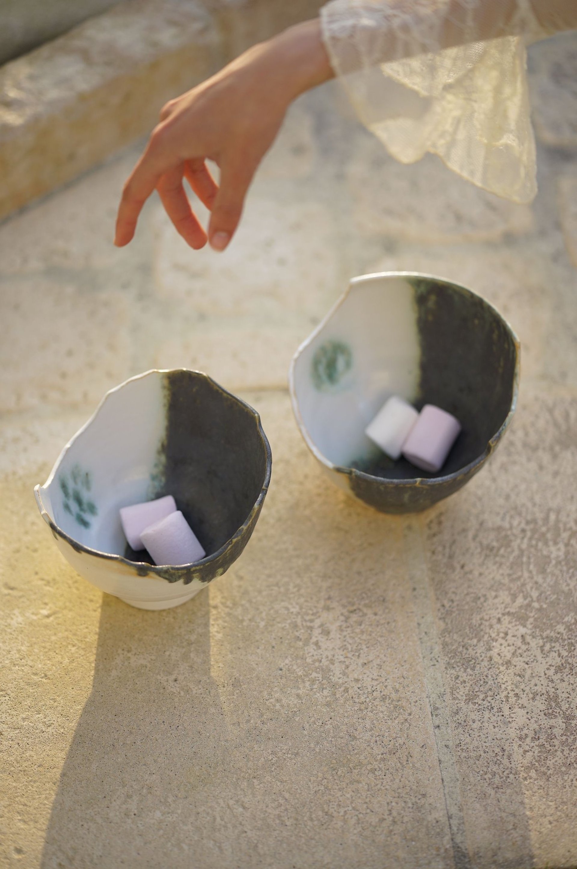 white and brown ceramic bowls