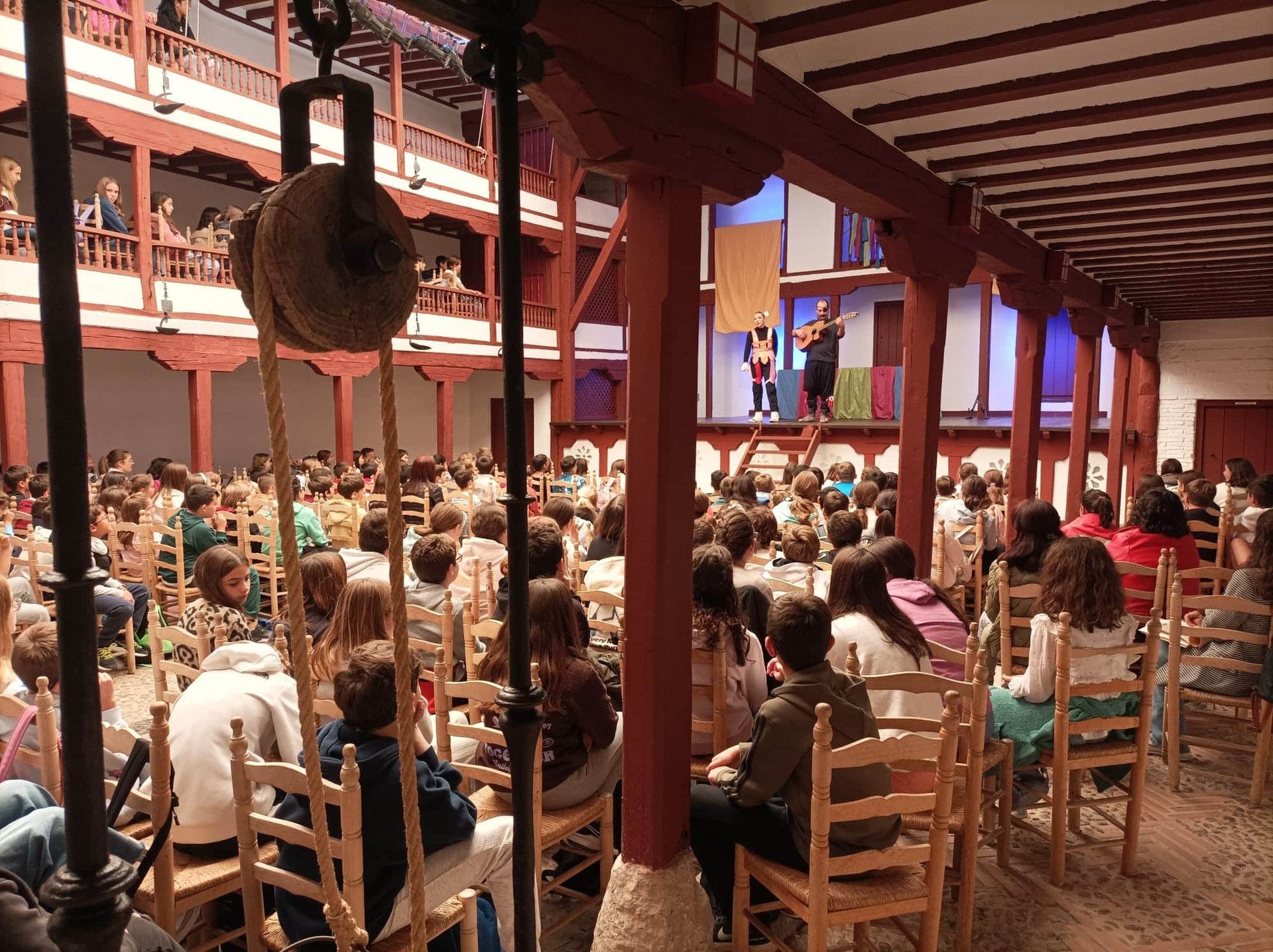 black and brown leather padded tub sofa