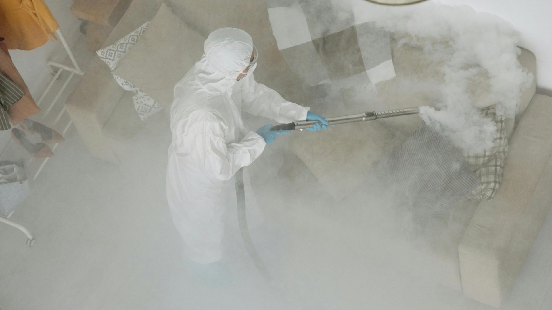 woman wearing yellow long-sleeved dress under white clouds and blue sky during daytime