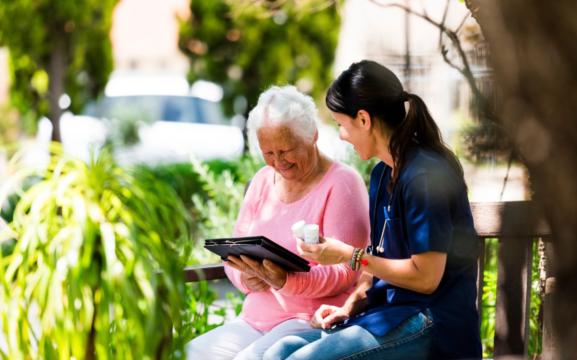 A person with a blood pressure device in their hand