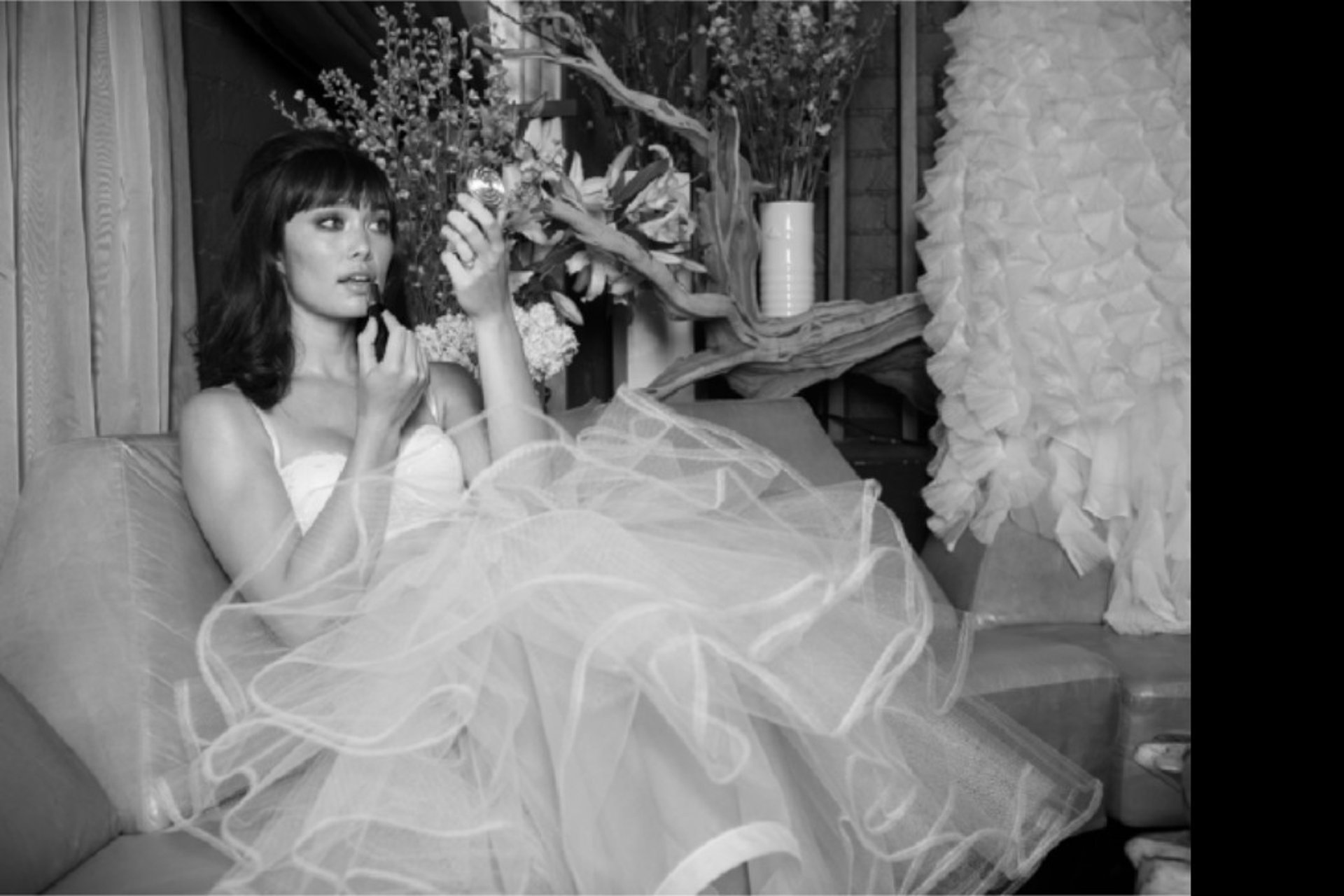 woman wearing yellow long-sleeved dress under white clouds and blue sky during daytime